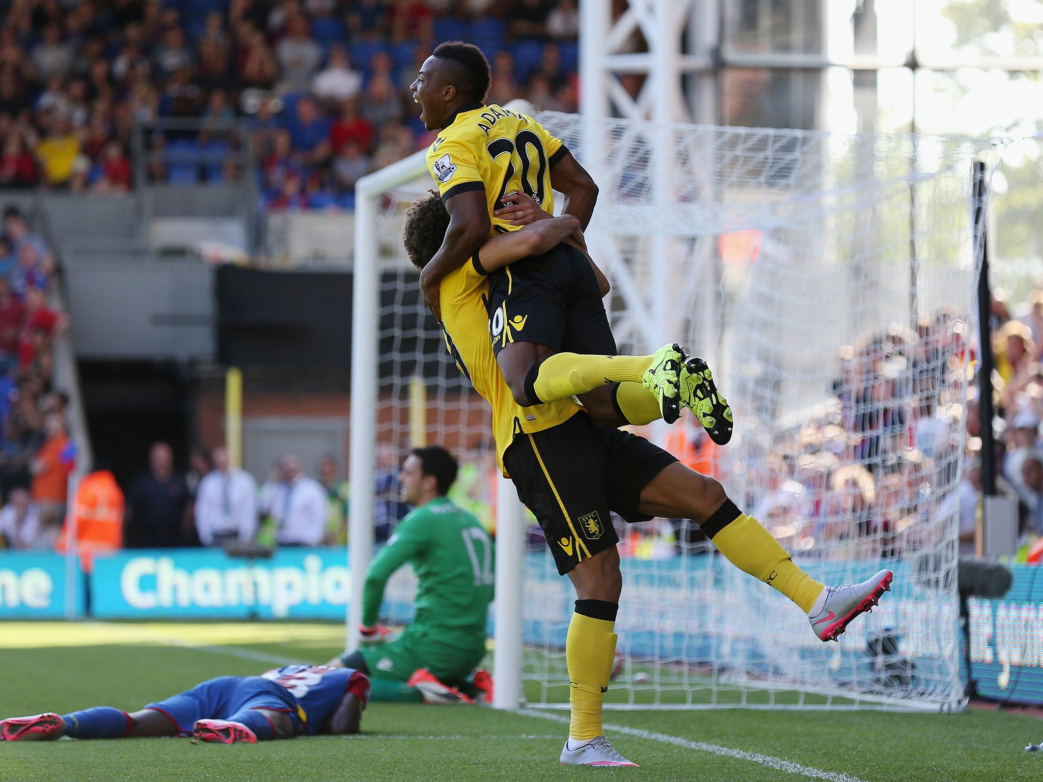 Aston Villa celebrate after Pape Souare diverts the ball into his own net