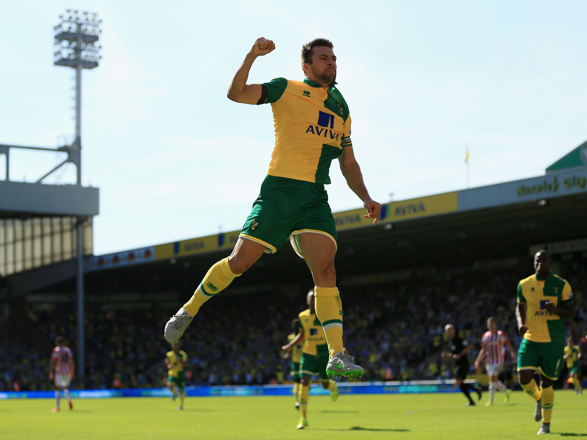 Russell Martin leaps for joy after equalising for Norwich