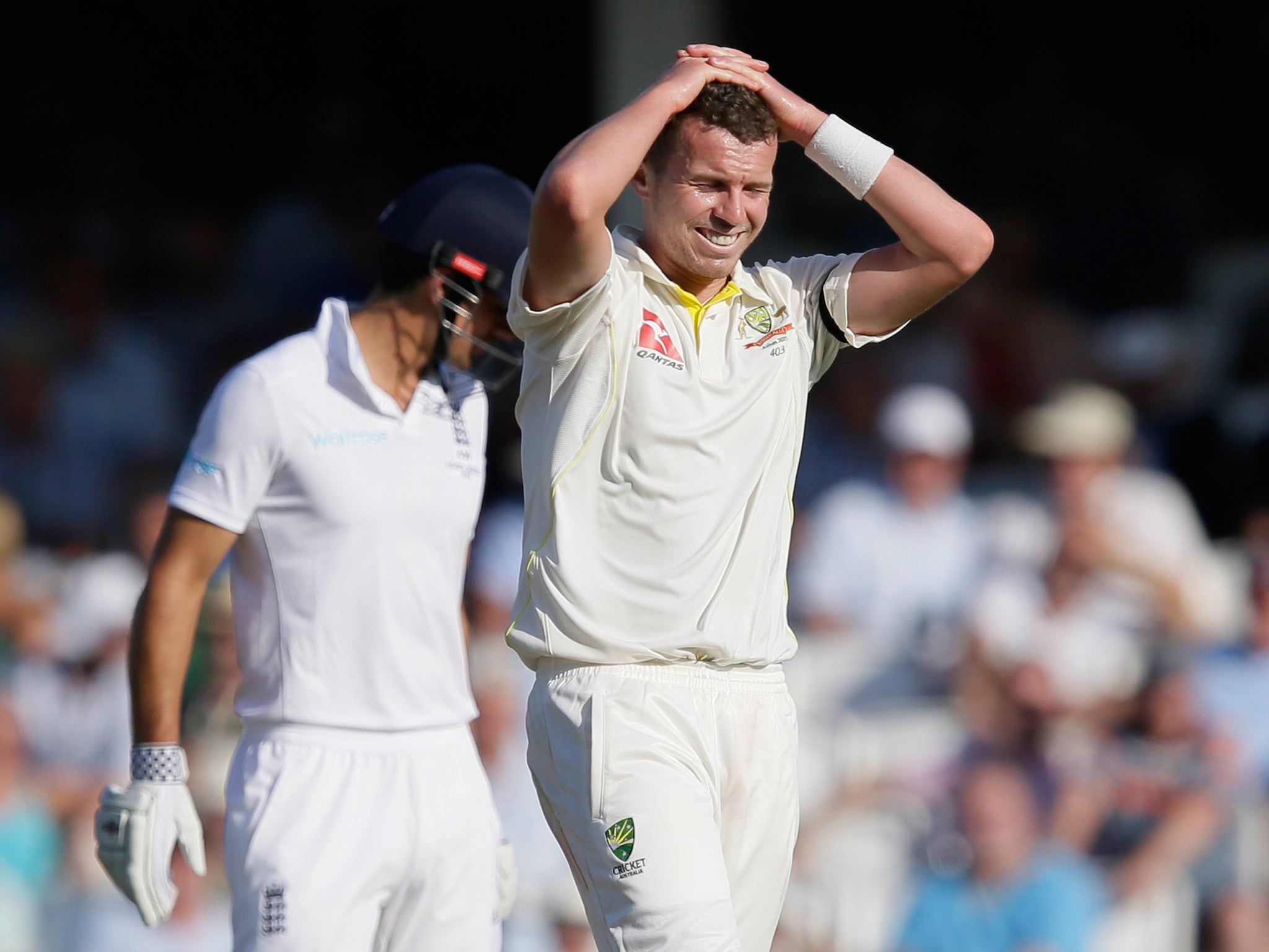 Australiaís Peter Siddle holds his hands to his head after bowling to Englandís Jos Buttler on the third day of the fifth Ashes Test match