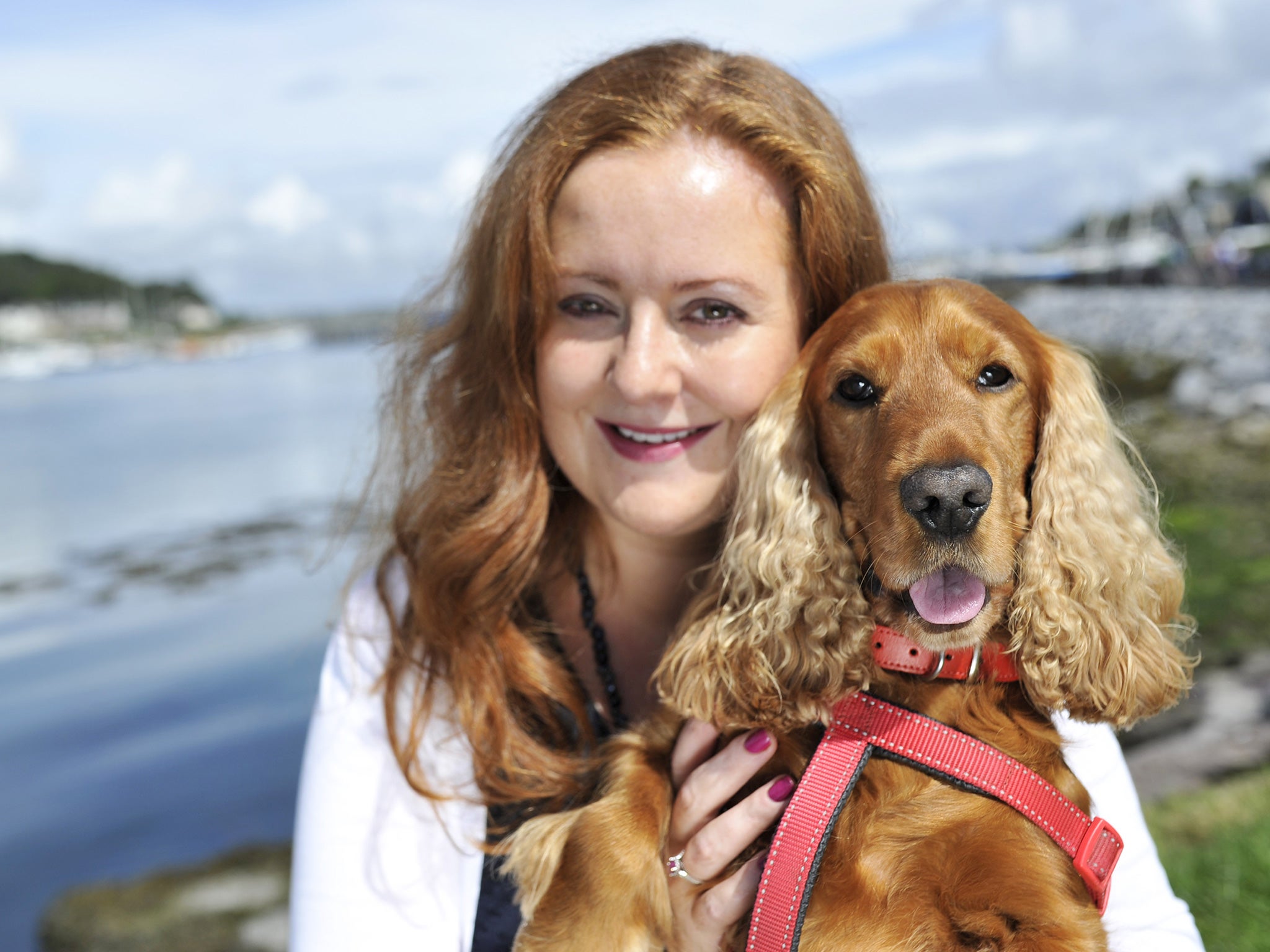 Rory the red haired Cocker Spaniel and his owner, Veneta Broderick