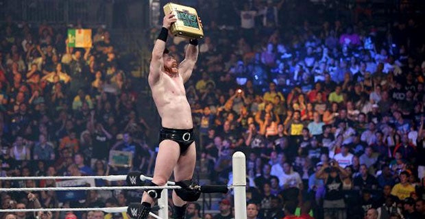 Sheamus celebrates his win over Randy Orton with is Money in the Bank contract
