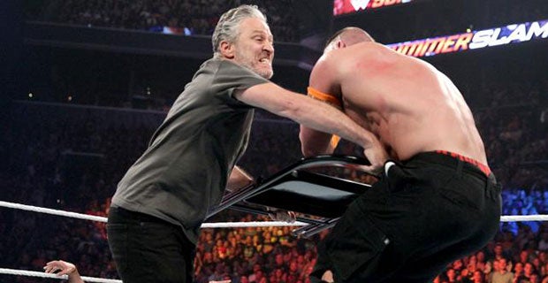 Jon Stewart hits Cena with a chair