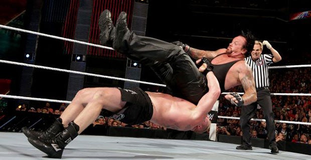 Lesnar suplexes Undertaker