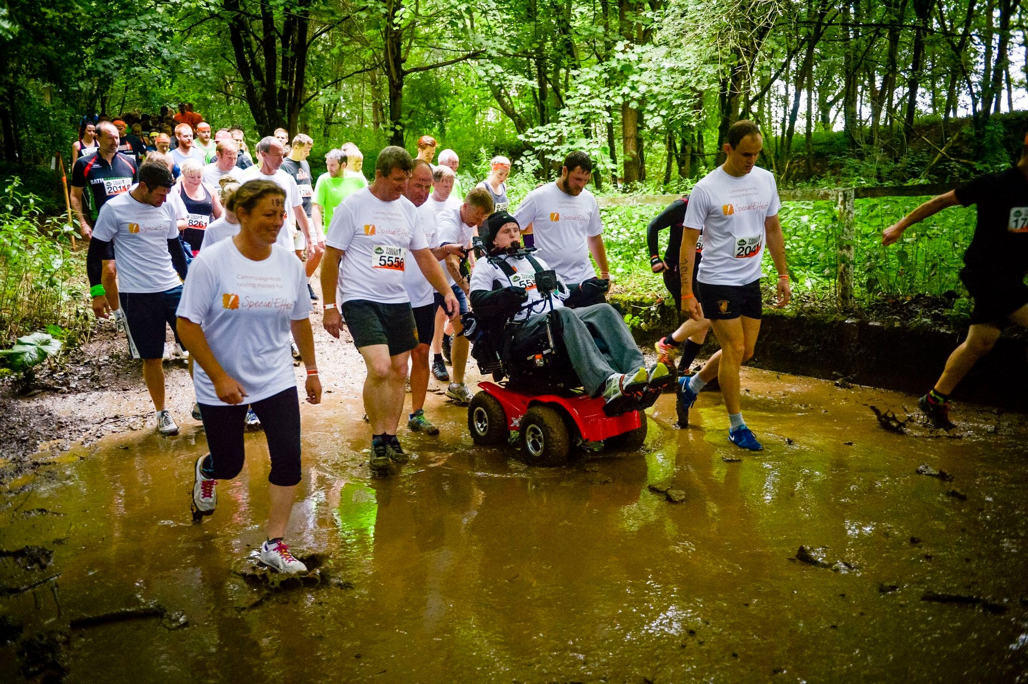 Rob Camm enters the mud with his teamates