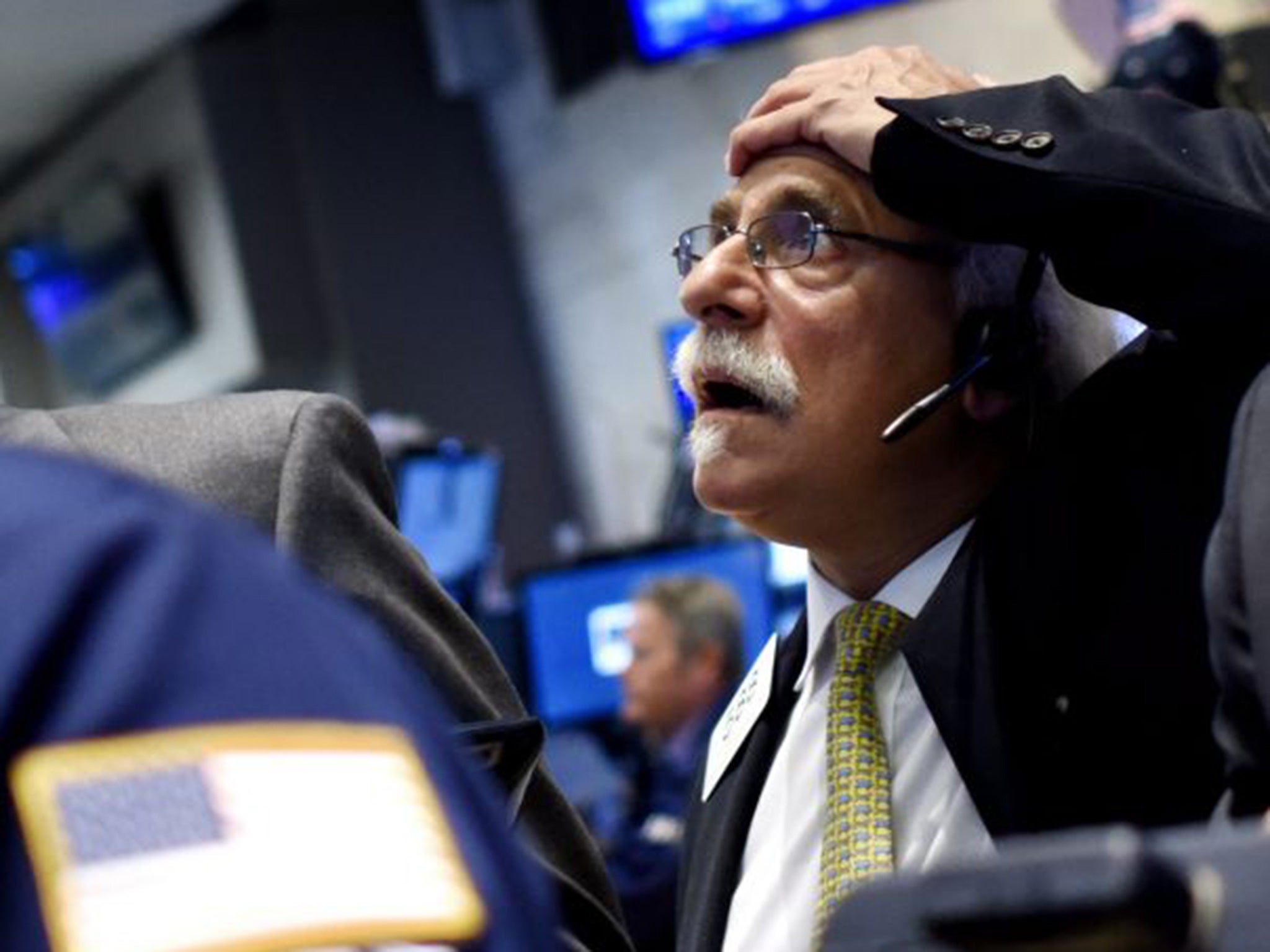 A trader on the floor of the New York Stock Exchange