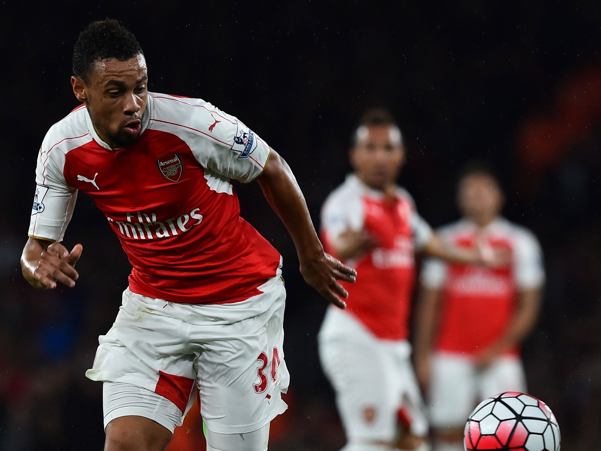 Arsenal midfielder Francis Coquelin (left) in action