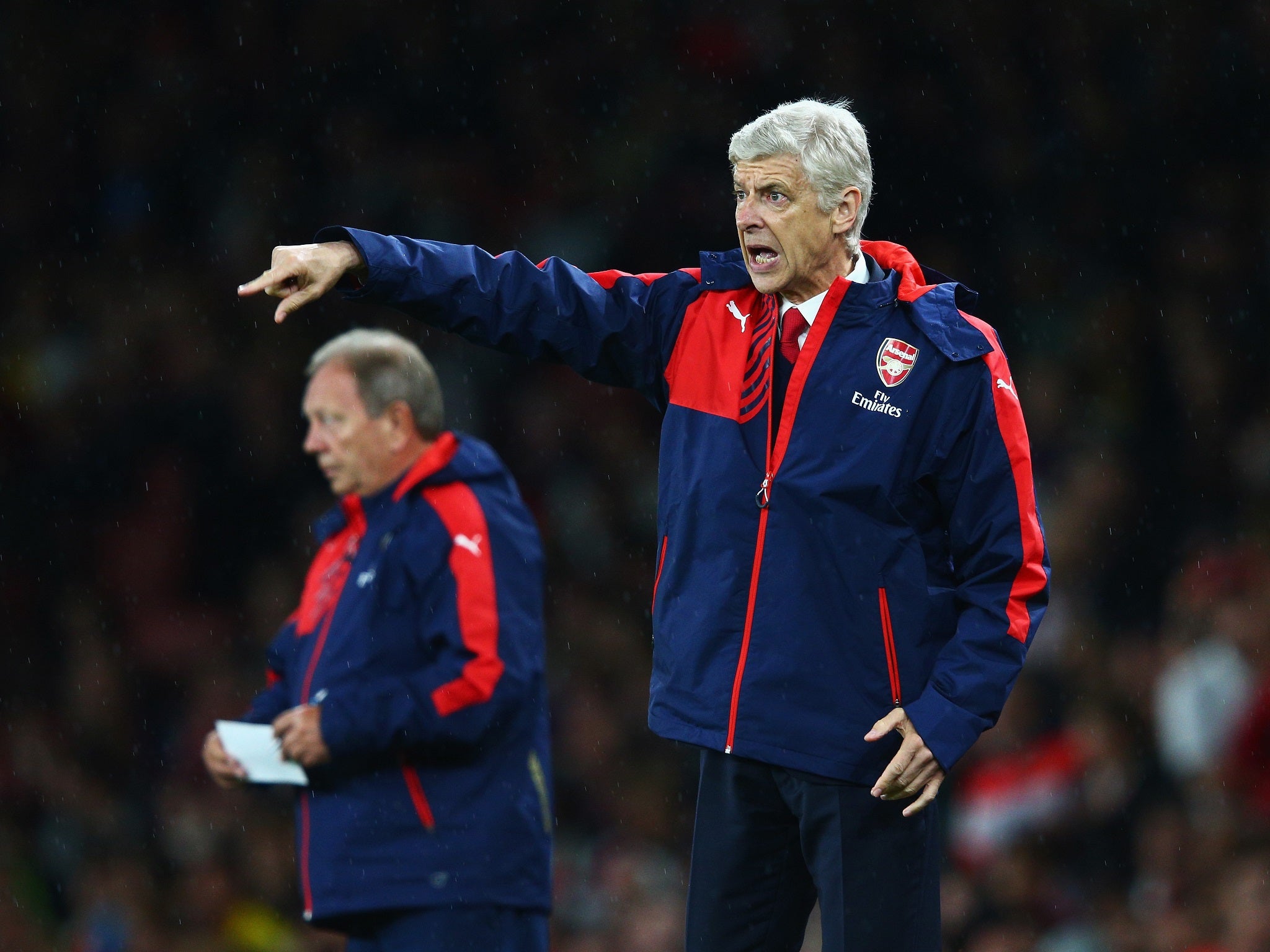 Arsene Wenger looks on from the touchline