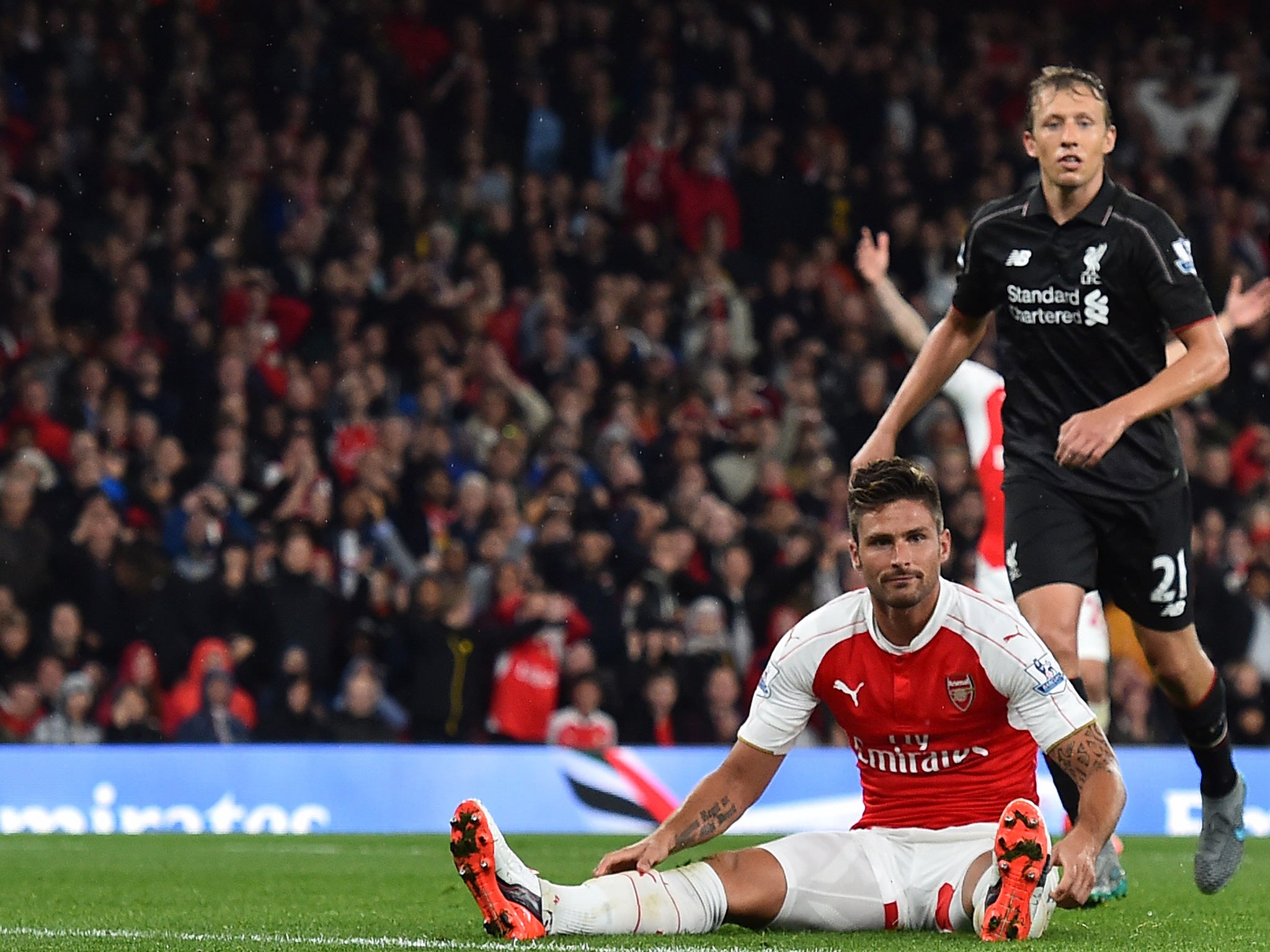 Olivier Giroud rues a missed chance against Liverpool