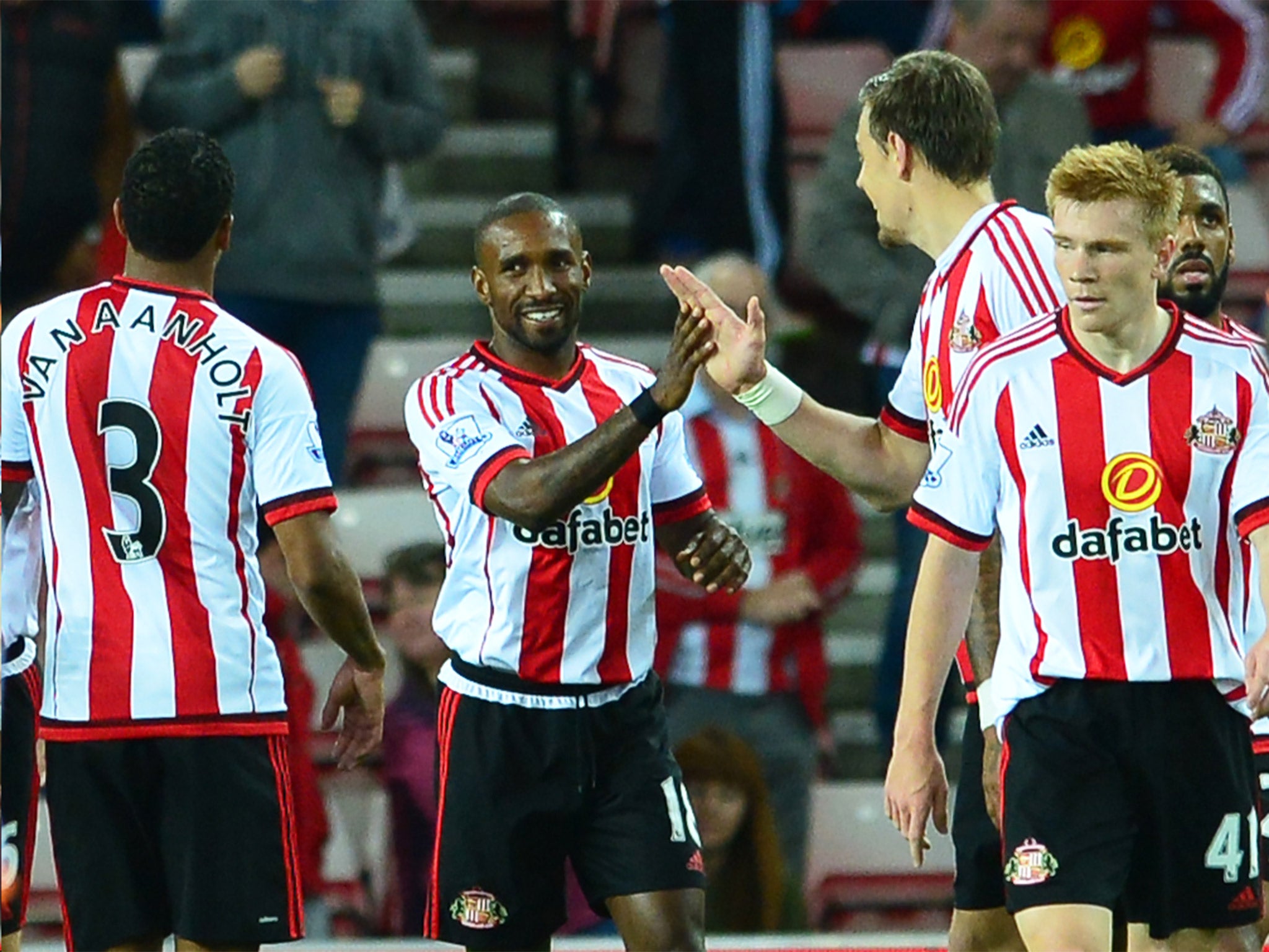 Hat-trick hero Jermain Defoe receives congratulations from his teammates