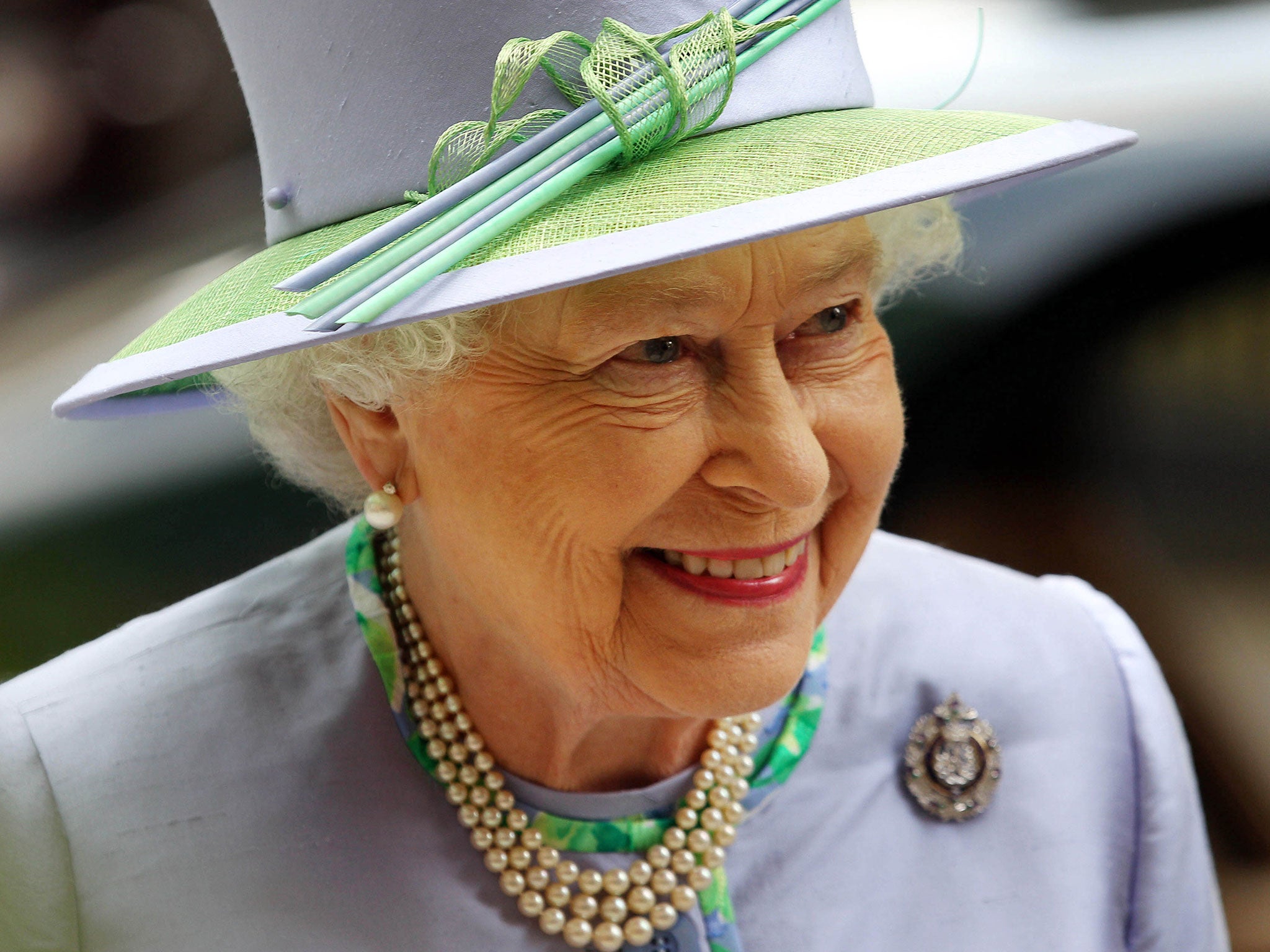 Queen Elizabeth II attends a dinner with The Argyll and Sutherland Highlanders, 5th Battalion The Royal Regiment of Scotland at the Caledonian Club on May 30, 2012 in London, England.