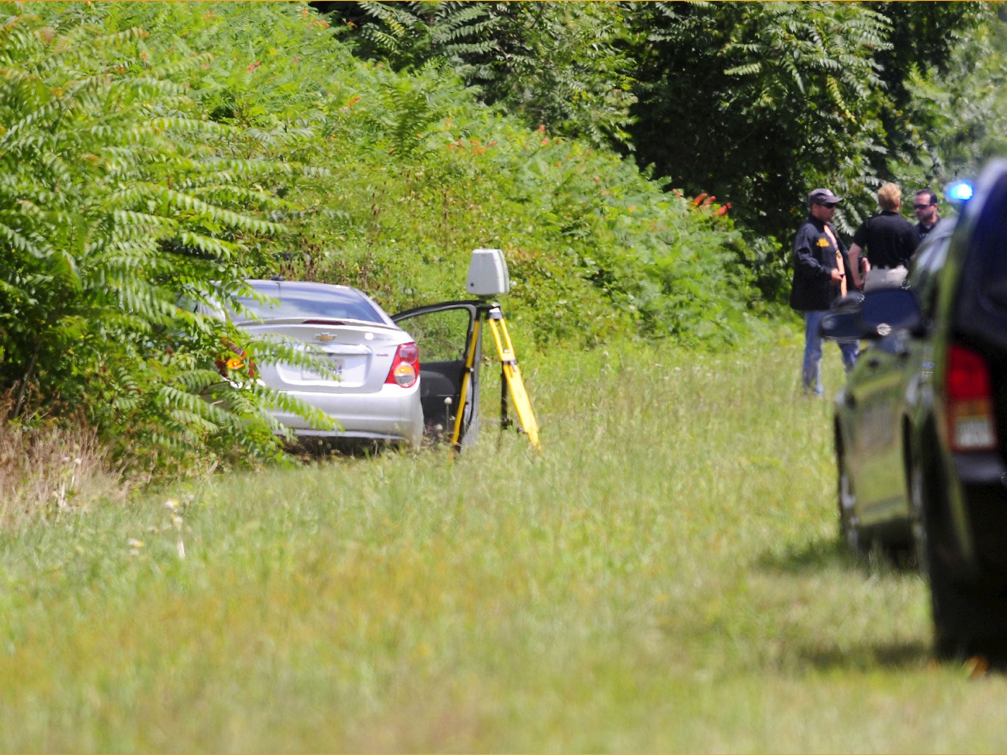 The car of suspected gunman Vester Lee Flanagan, also known as Bryce Williams, is where it crashed off Highway I-66