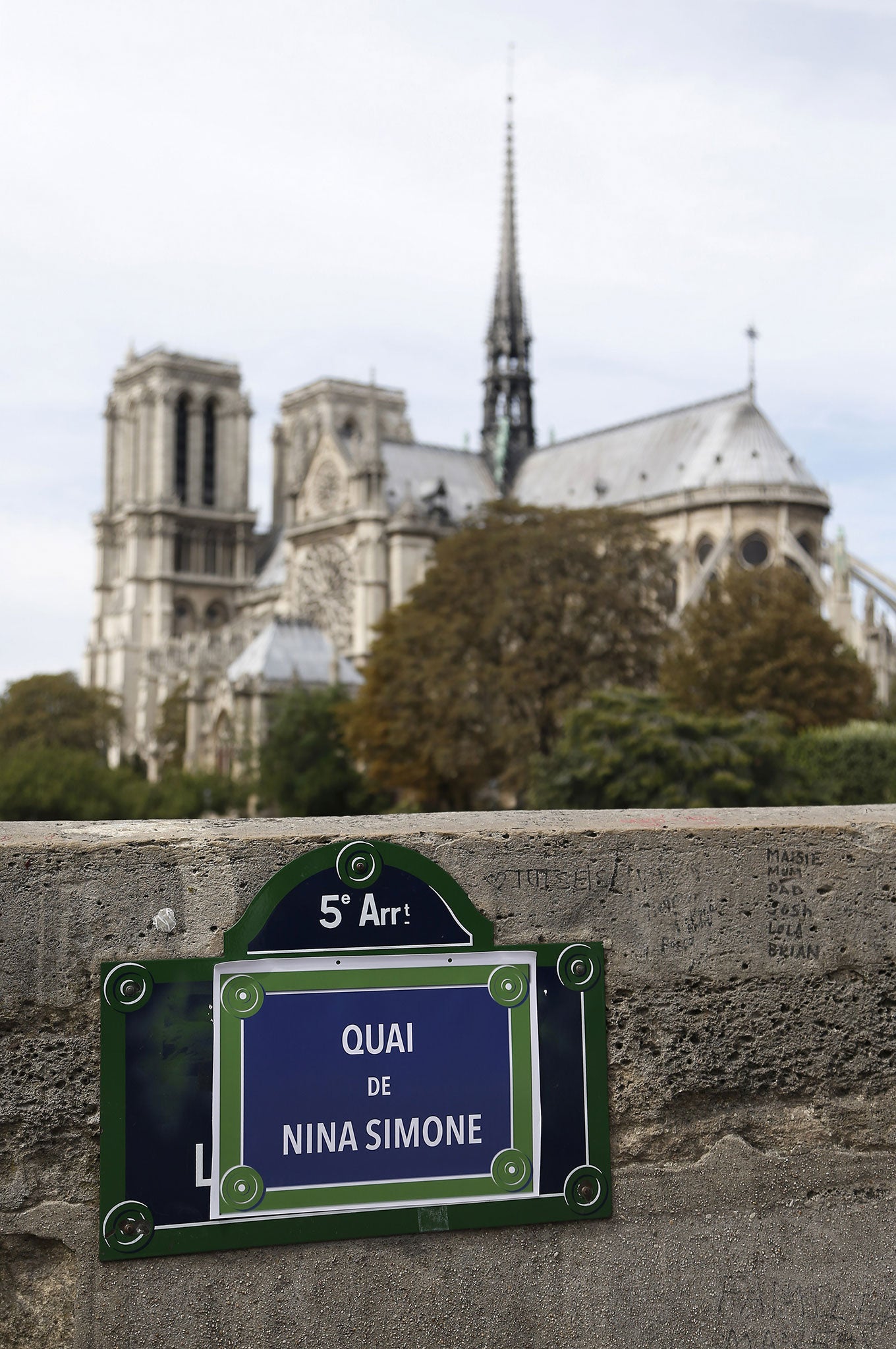 A sign by French organisation Osez le Feminisme! which celebrates the achievements of women