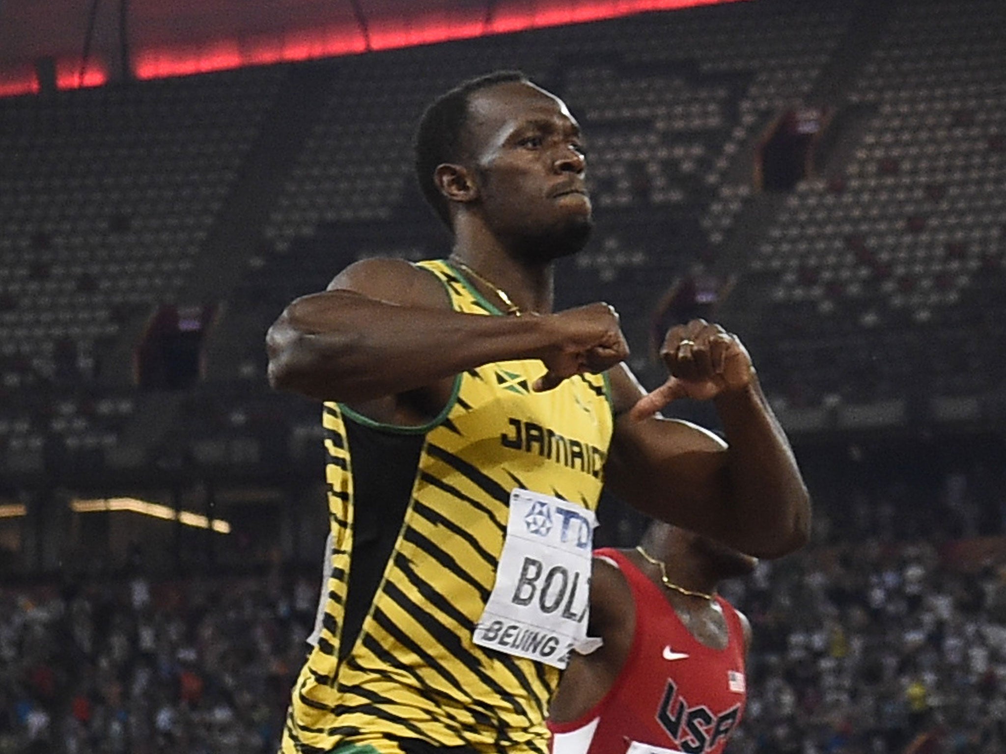 Usain Bolt celebrates his 200m triumph