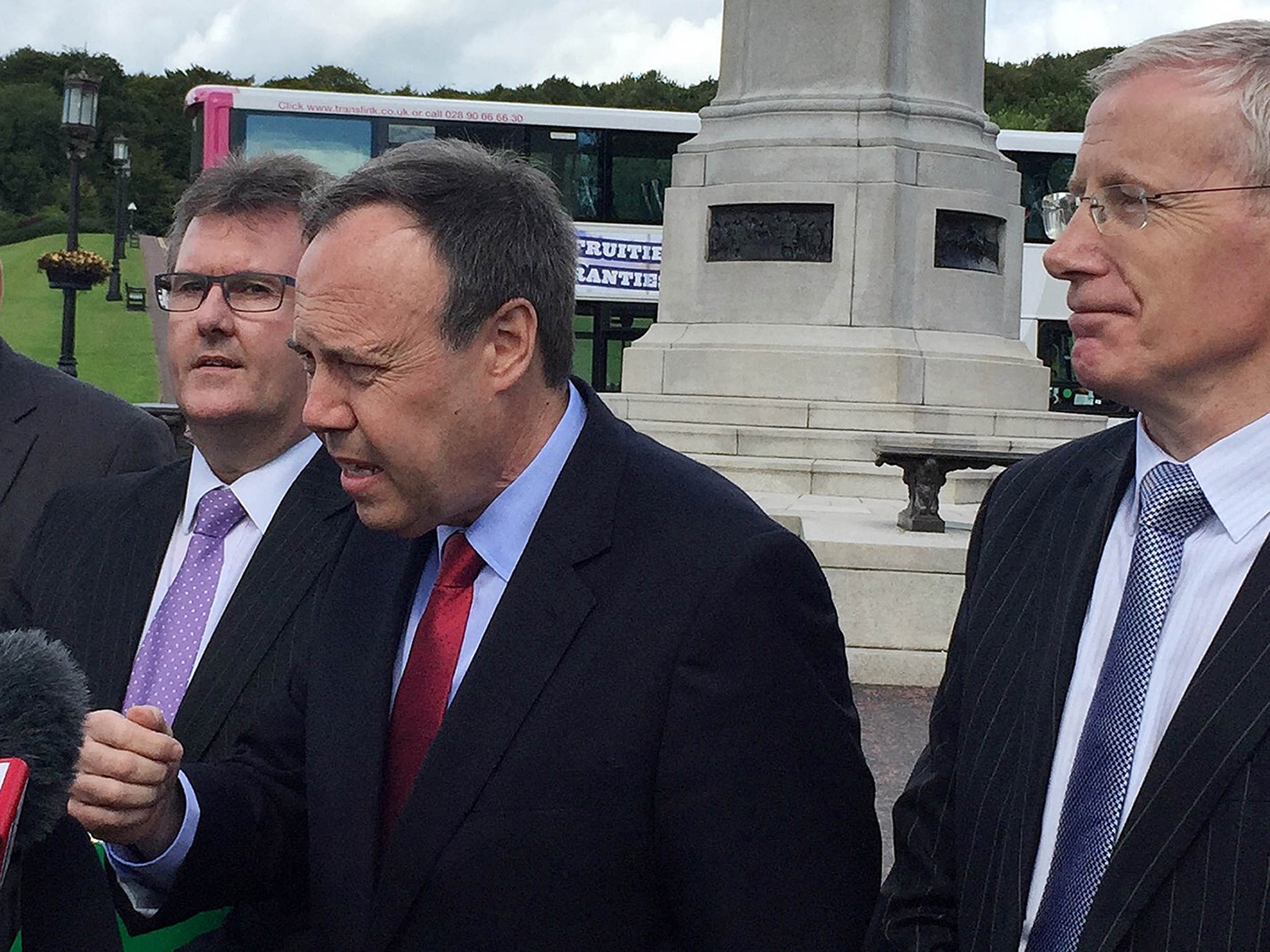 DUP deputy leader Nigel Dodds centre flanked by MPs Jeffrey Donaldson (left) and Gregory Campbell (right) outside Stormont House,