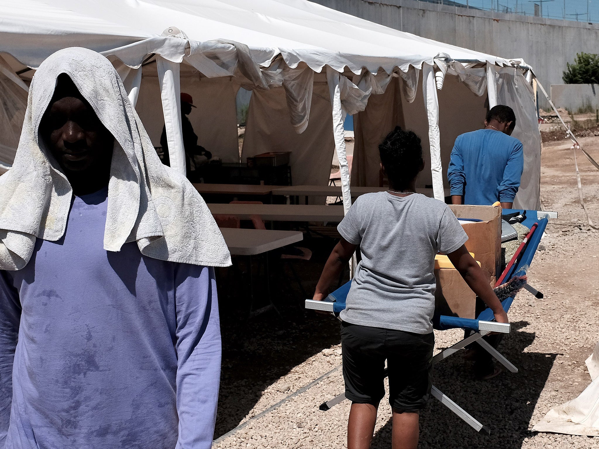 Eritrean migrants at a camp near Rome