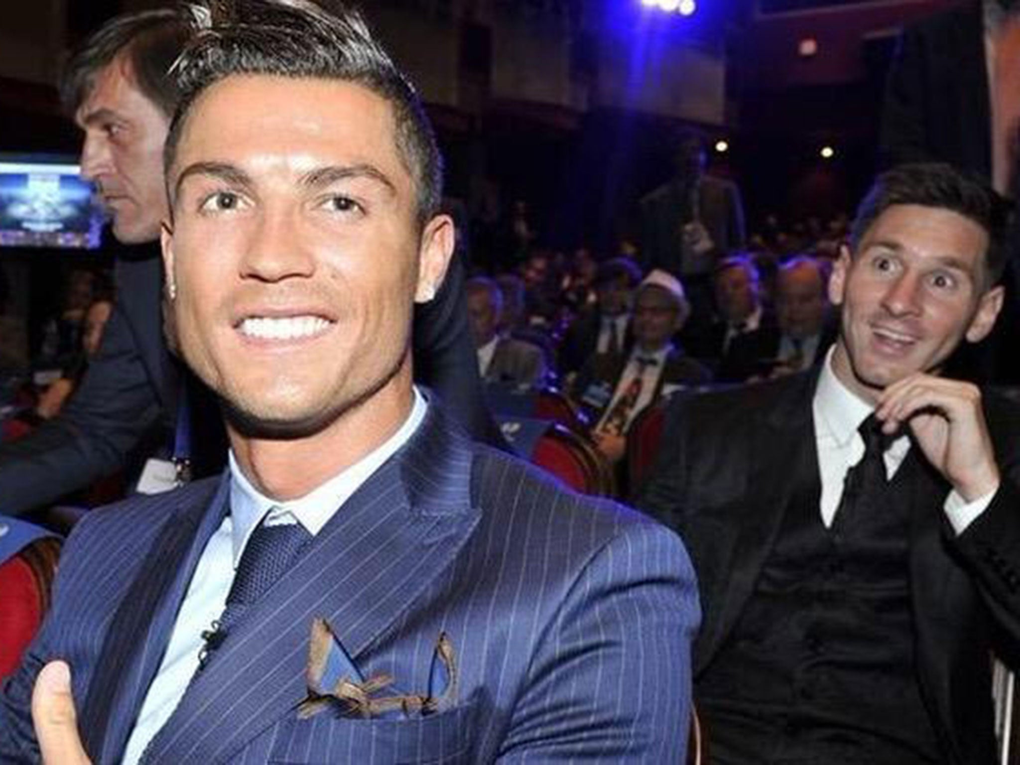 Cristiano Ronaldo is photobombed by Lionel Messi