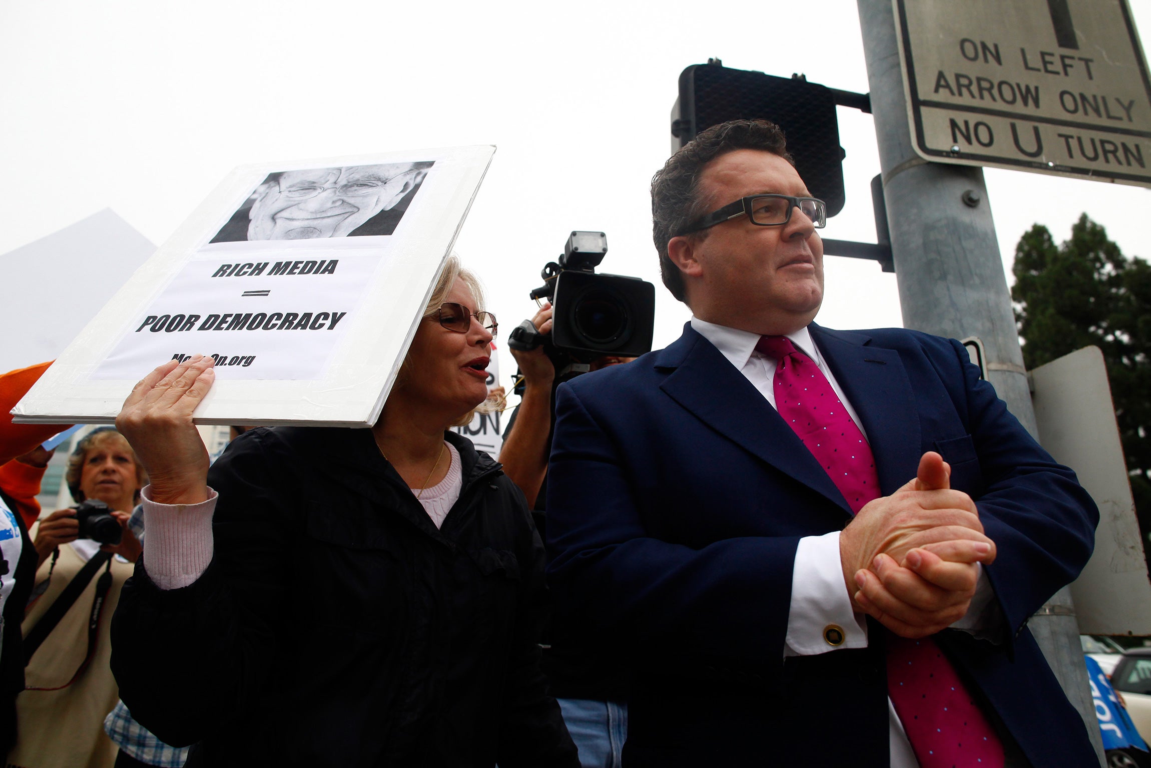 Tom Watson during a demonstration at the annual shareholder meeting of News Corp at Fox Studios October 21, 2011 in Century City, California