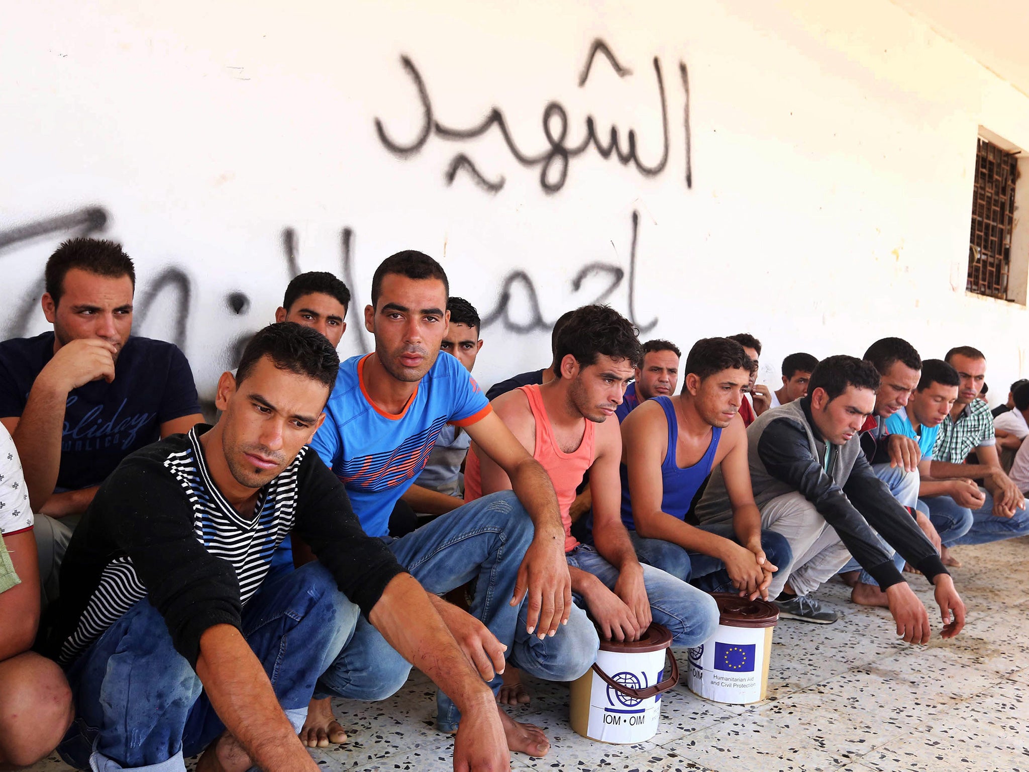 A group of the refugees rescued after their boats capsized