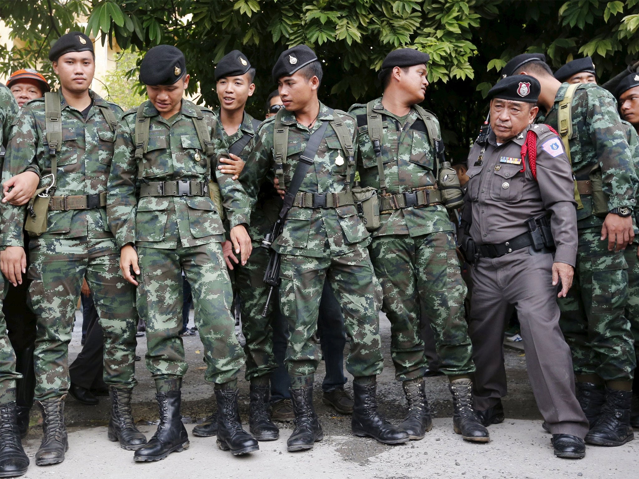 Thai army soldiers guard the scene in Bangkok