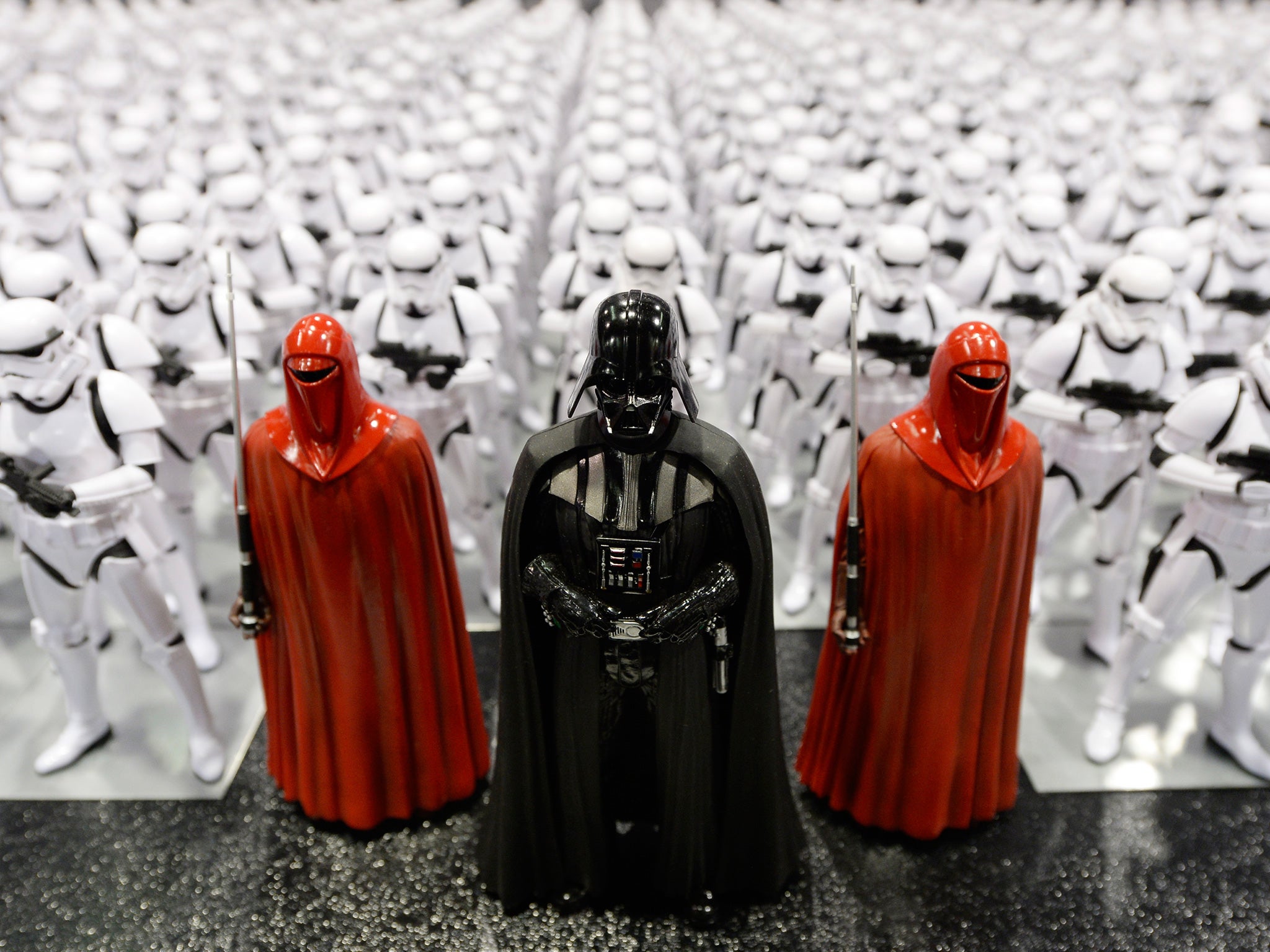 Darth Vader (C) and Stormtrooper figurines are displayed during the kick-off event of Disney's Star Wars Celebration 2015