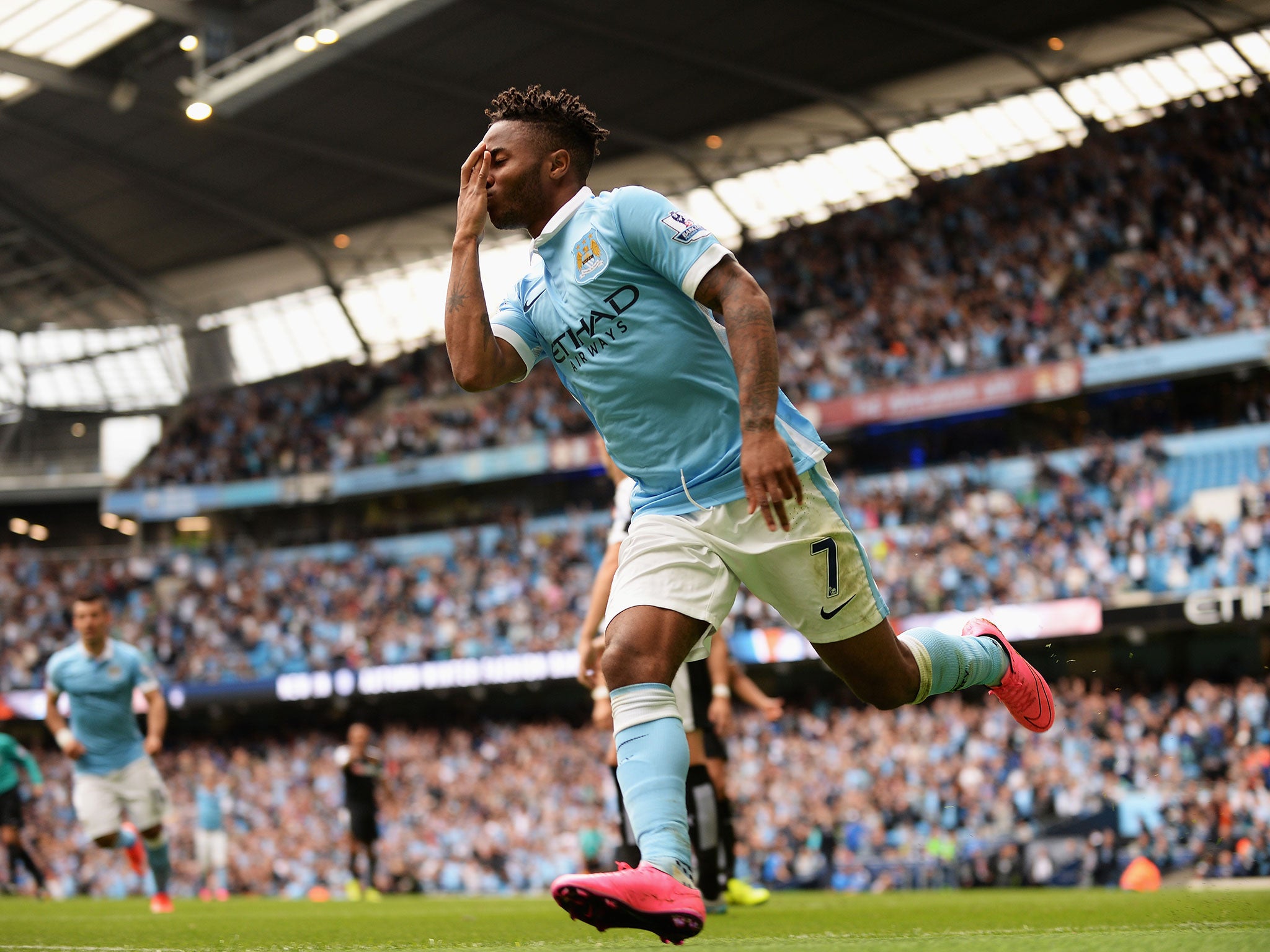 Raheem Sterling celebrates scoring for Manchester City