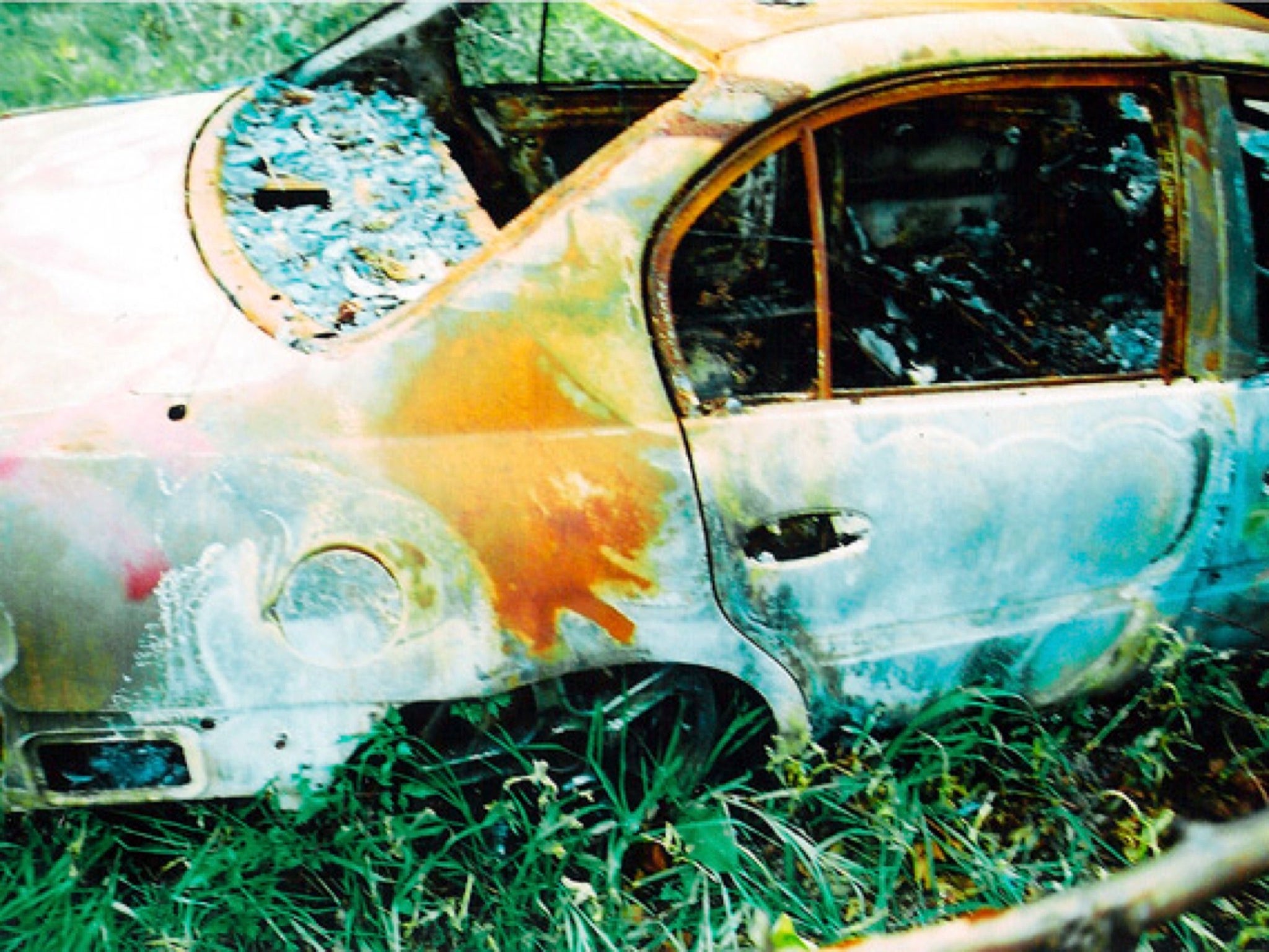 The burned-out Chevrolet Malibu in which Henry Glover's remains were found