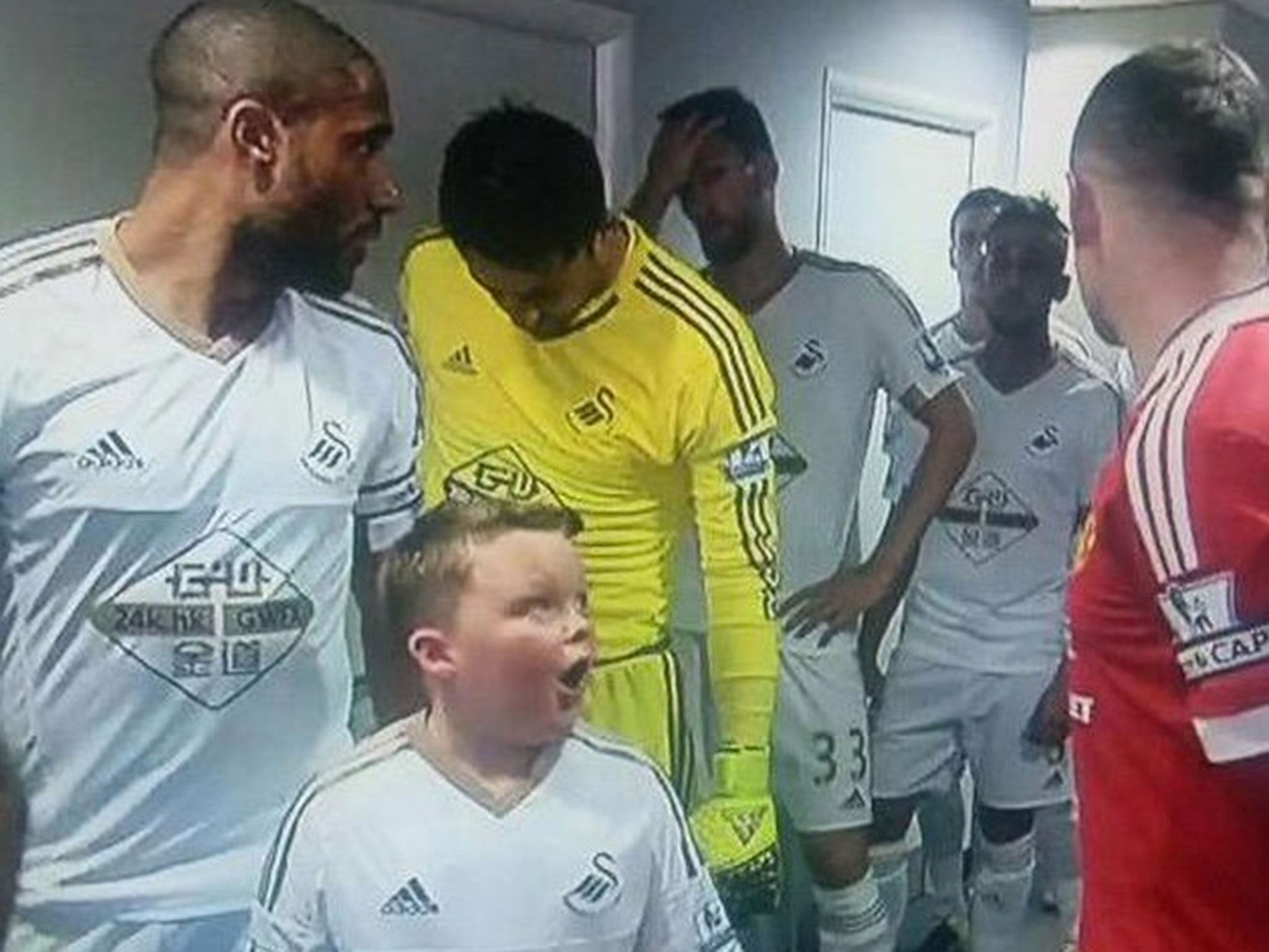 The mascot spots Wayne Rooney