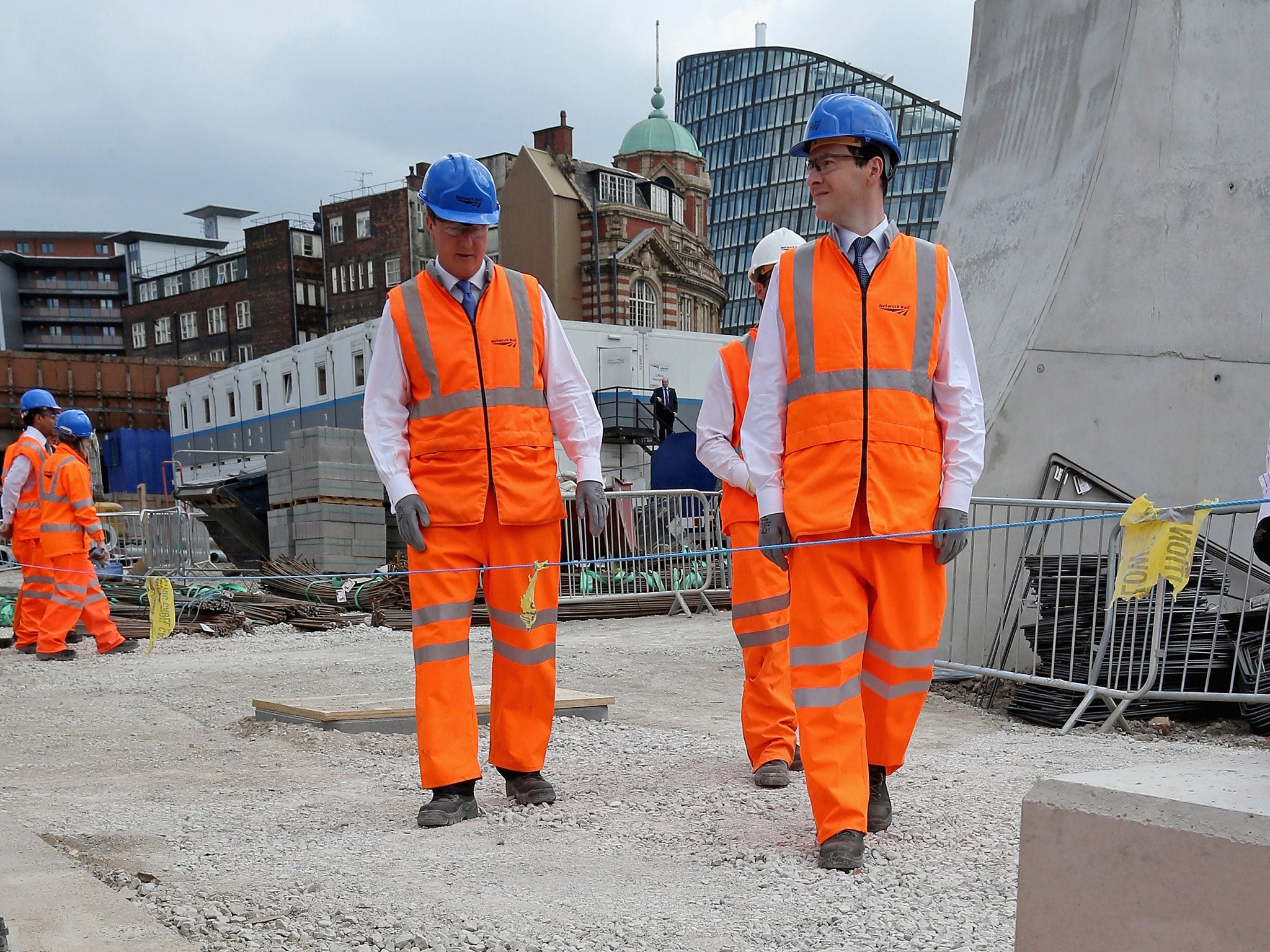 David Cameron and George Osborne at Victoria station in Manchester