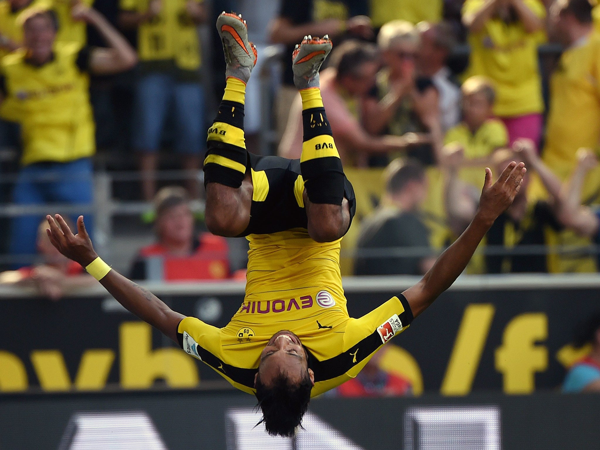 Dortmund's Gabonese striker Pierre-Emerick Aubameyang makes a jump after scoring during the German first division Bundesliga football match Borussia Dortmund vs Hertha BSC in Dortmund, Germany