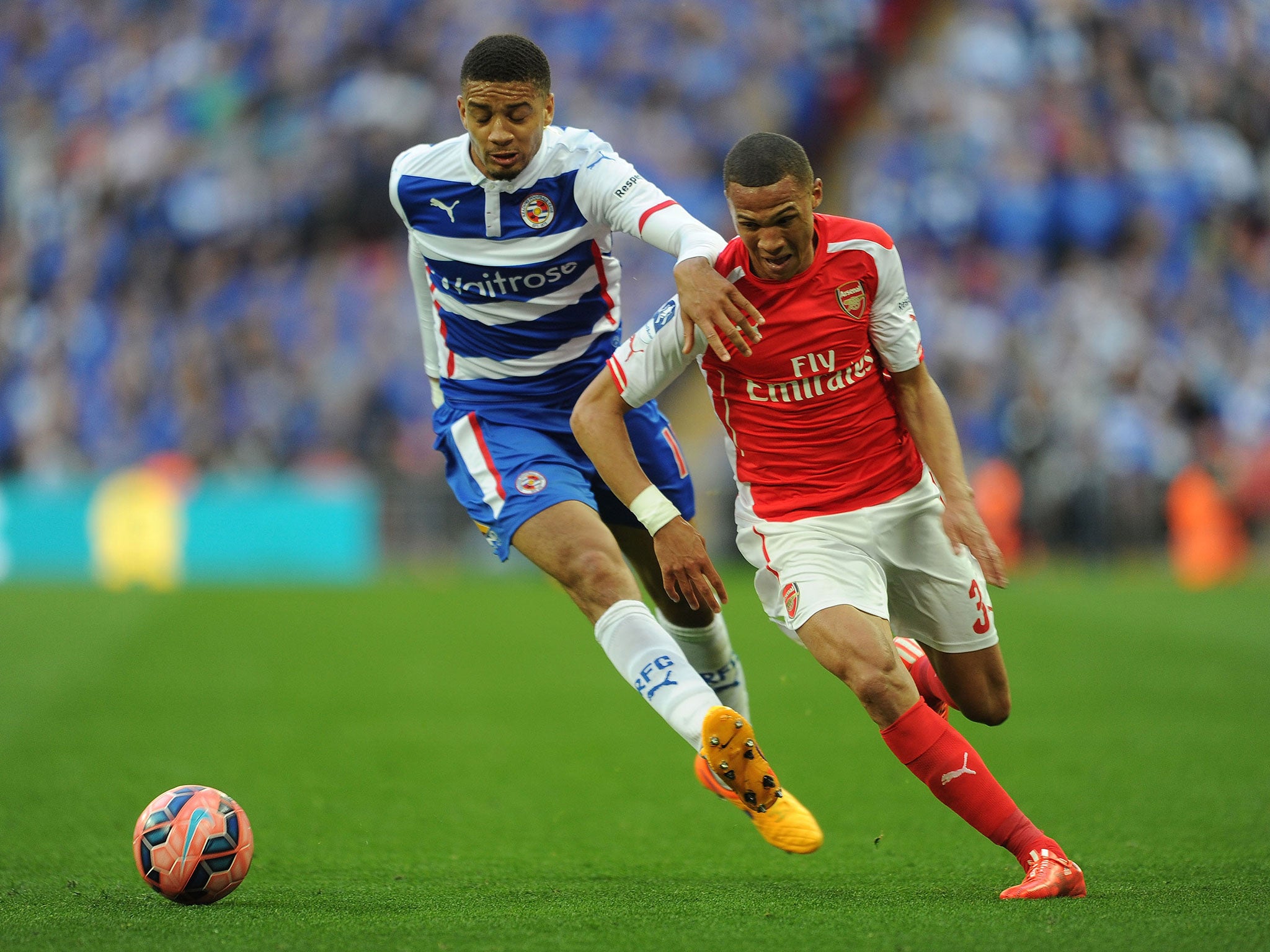 Michael Hector challenges Arsenal's Kieran Gibbs