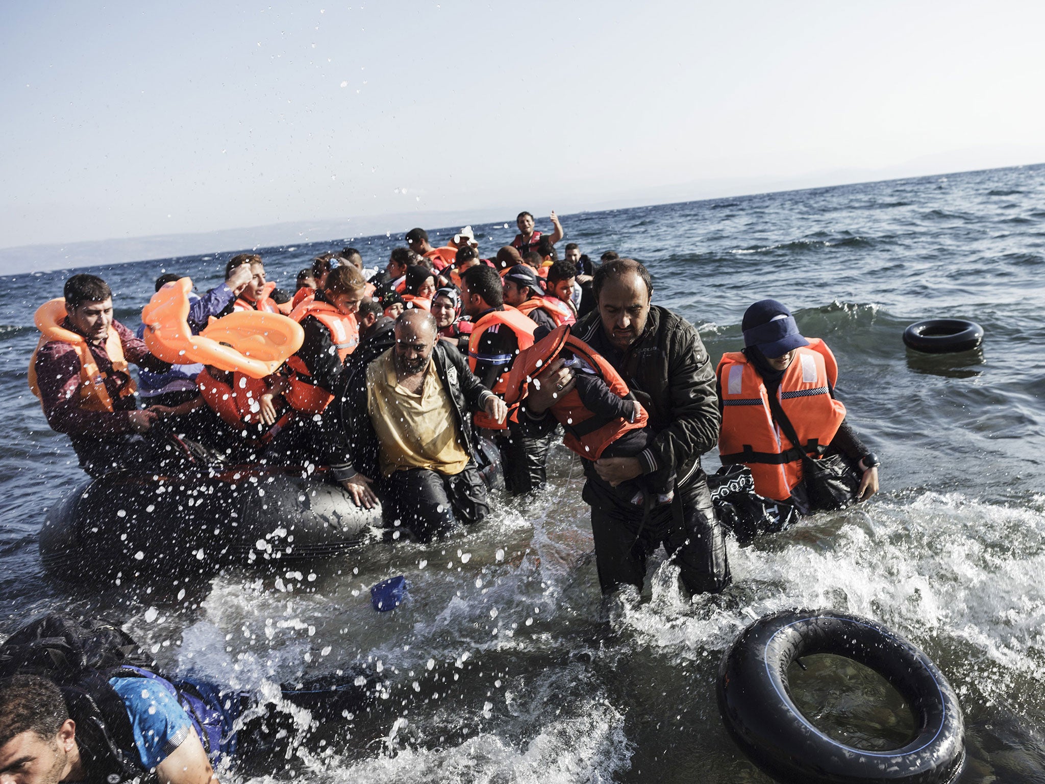 Syrian refugees arrive on the shores of Lesvos island