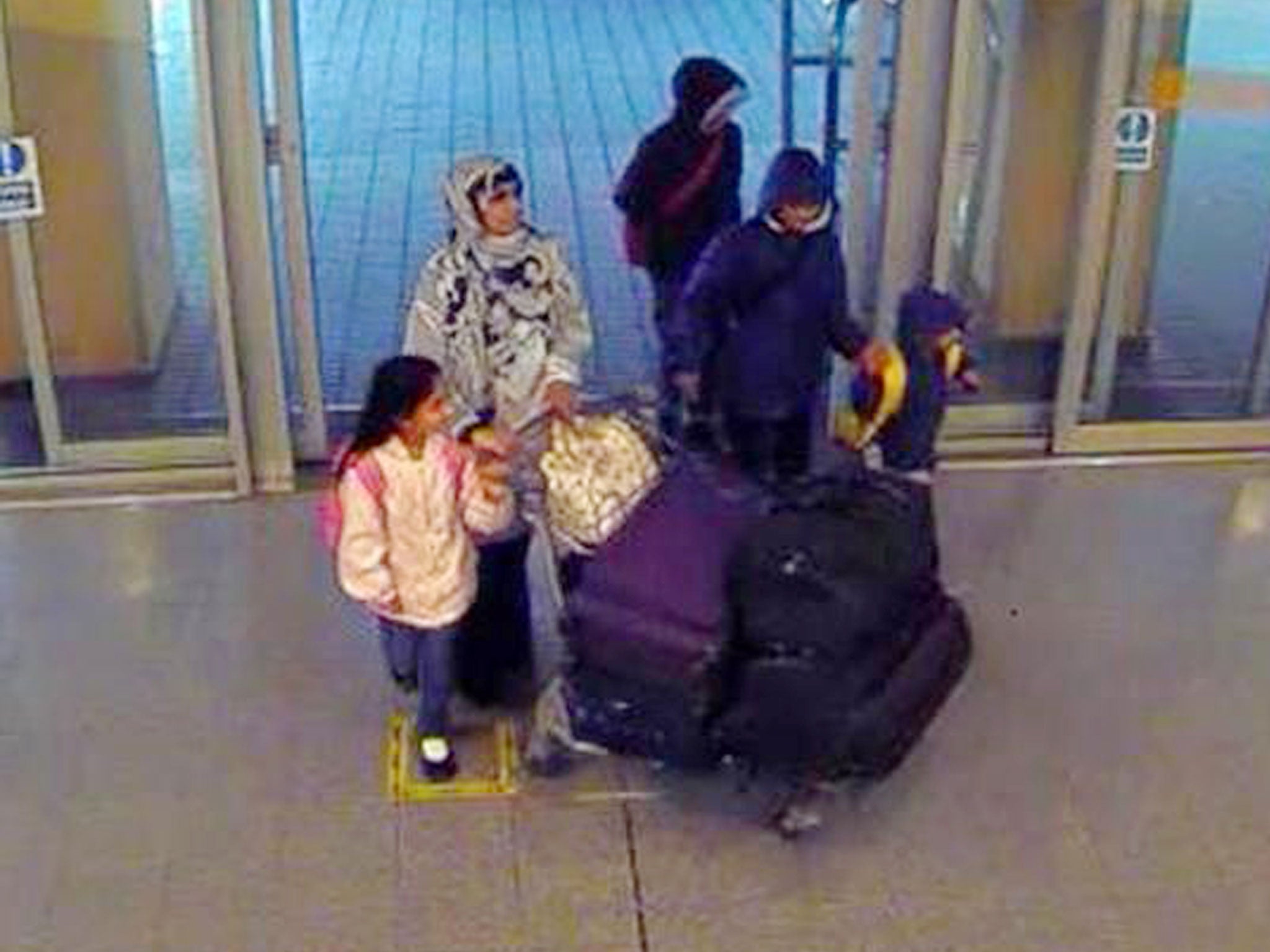 Zaheera Tariq with her children at London City Airport