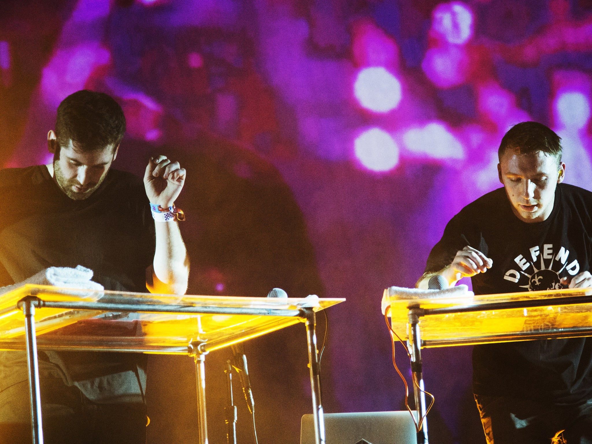 Harrison Mills and Clayton Knight of the American electronic music duo Odesza perform on day three of the Coachella Music Festival