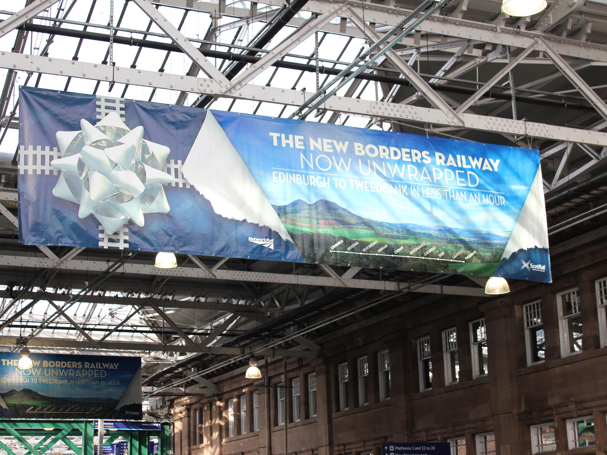 Banners in Edinburgh announce the opening