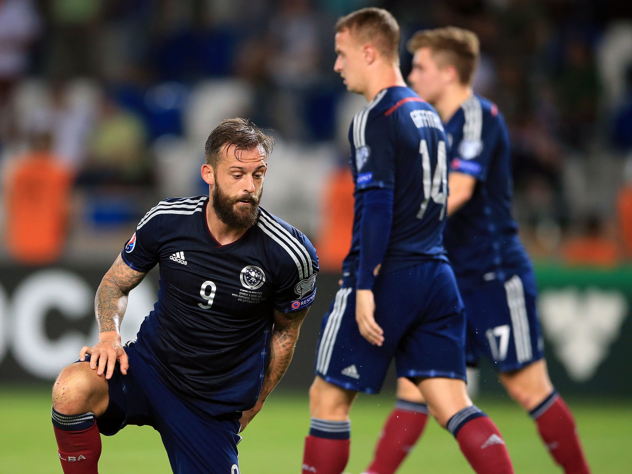 Steven Fletcher (left) is down and frustrated as Scotland fail to mount a threat to Georgia in Tbilisi