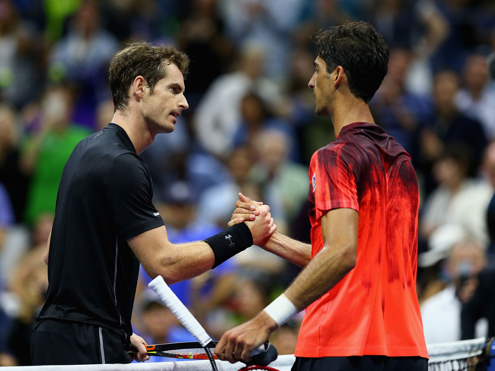 Thomaz Bellucci congratulates Andy Murray after the match