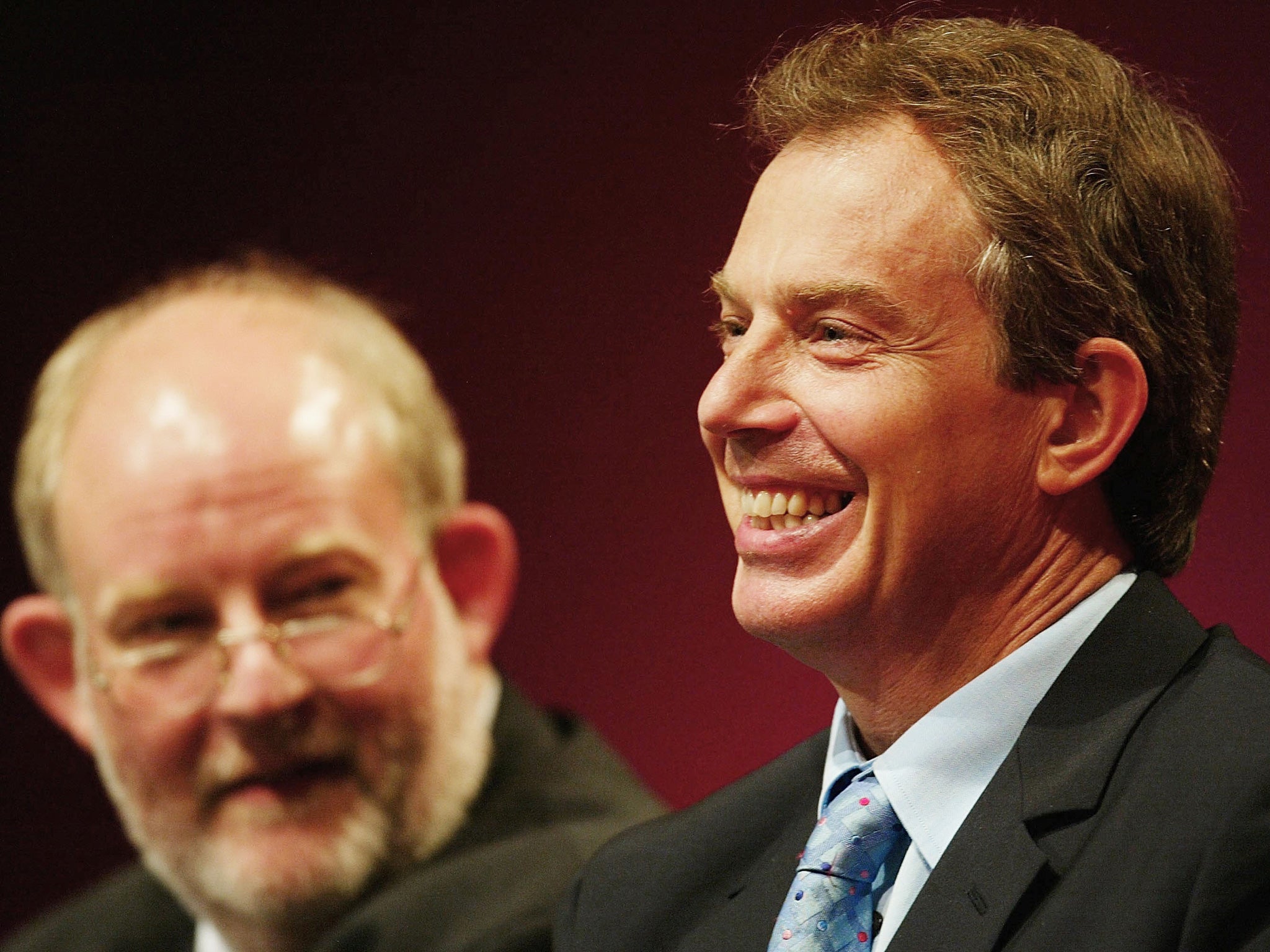 Follow my leader: Clarke gazes at Blair in 2002. In 2004, he became Home Secretary; two years later, Blair sacked him