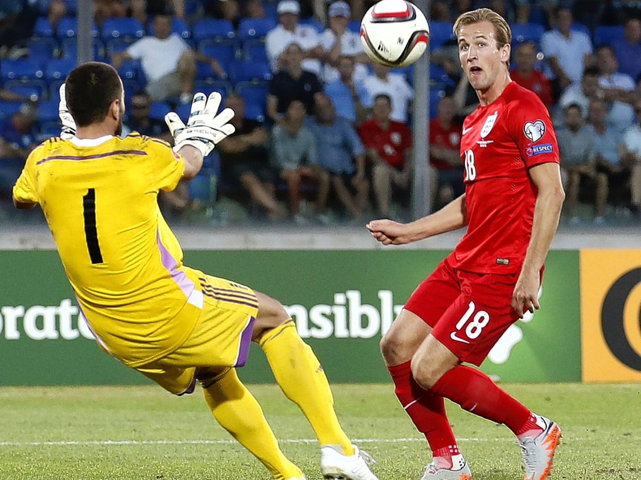 Harry Kane lobs the San Marino goalkeeper to score on Saturday night