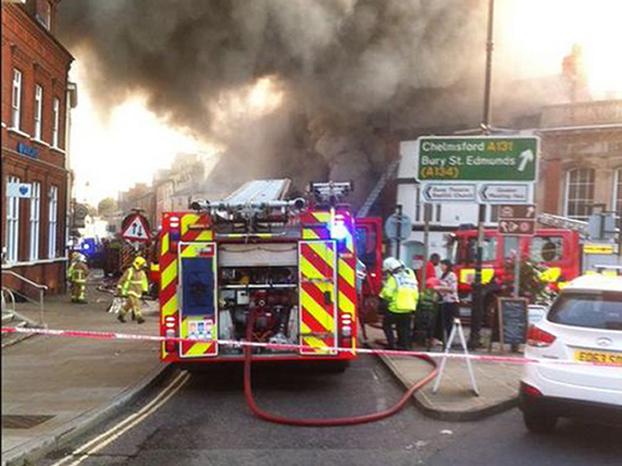 Photo taken with permission from the Twitter feed of @LukemCresswell of the fire that broke out in a block of flats in Sudbury, Suffolk