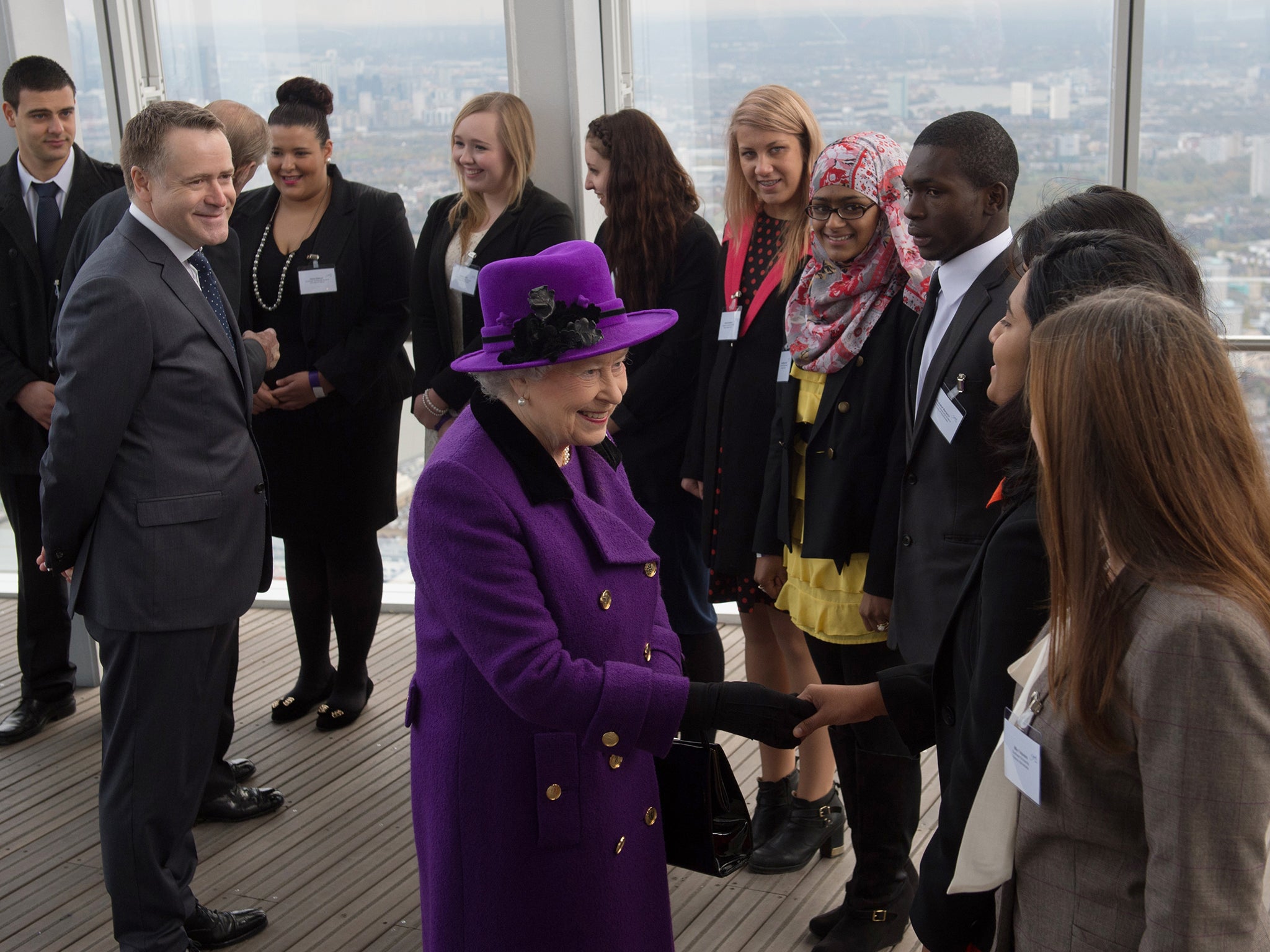 Queen Elizabeth II meets young people during an official visit to The Shard building in central London, 2013