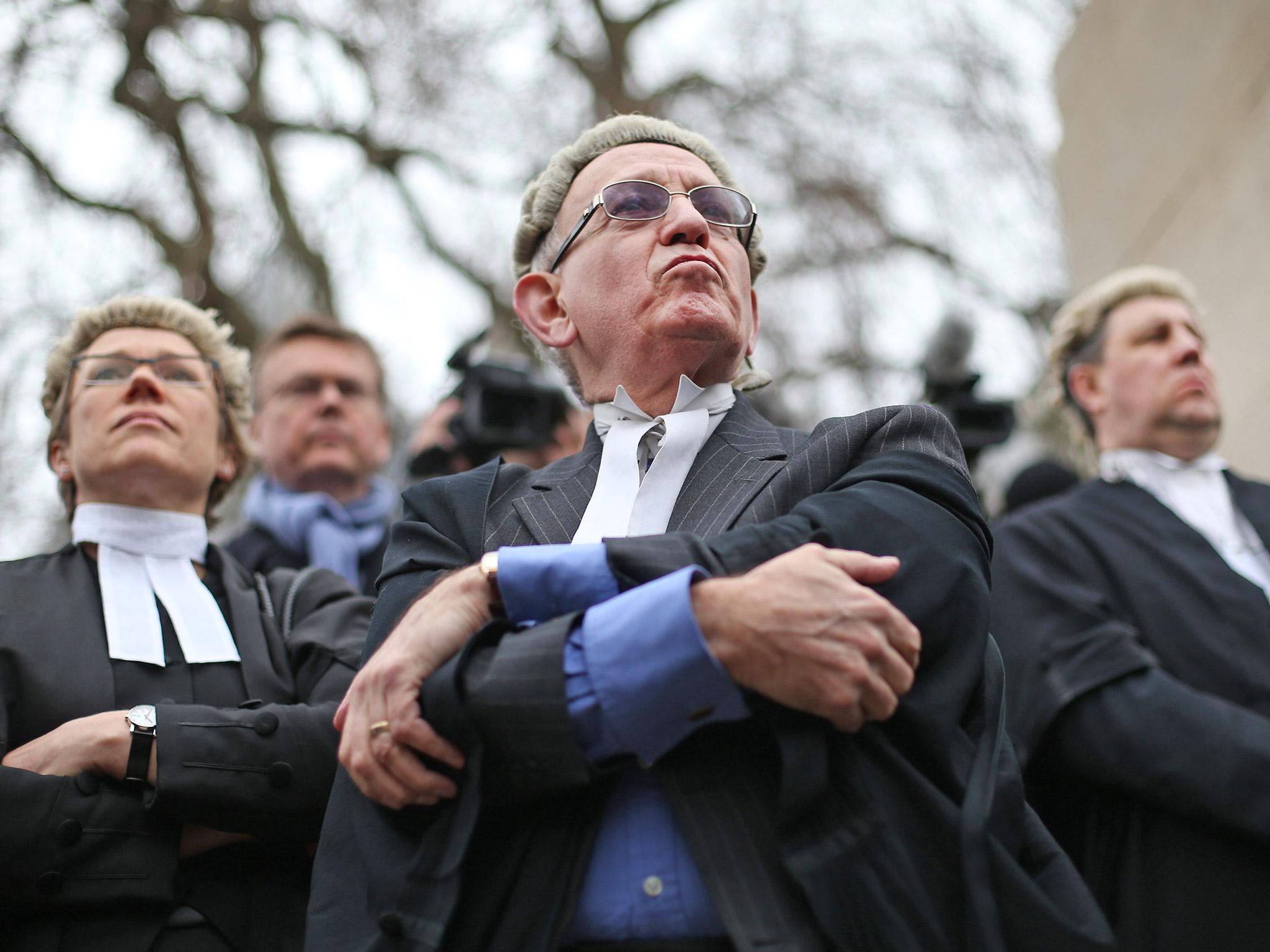 Barristers demonstrate against legal aid cuts outside Parliament last year