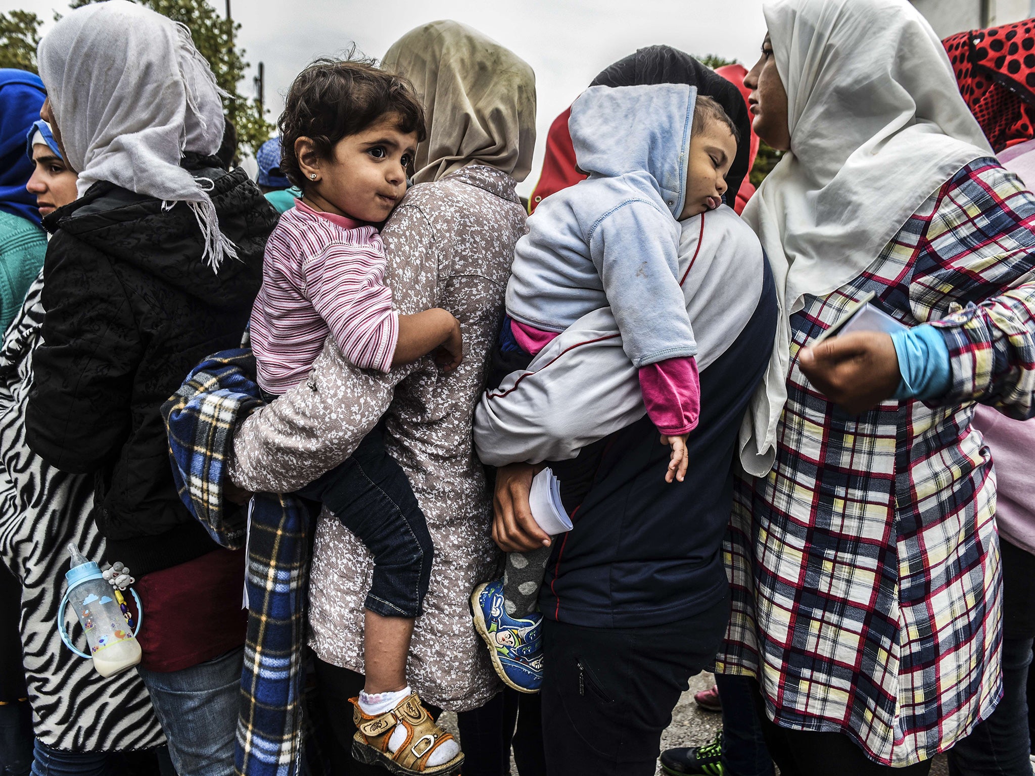 Refugees at a registration camp in Serbia’s most southerly town, Presevo, yesterday. A record 5,000 people arrived at Serbia’s border with Hungary between Thursday and yesterday. Around 3,000 of them have already entered Hungary and are on their way to Ge