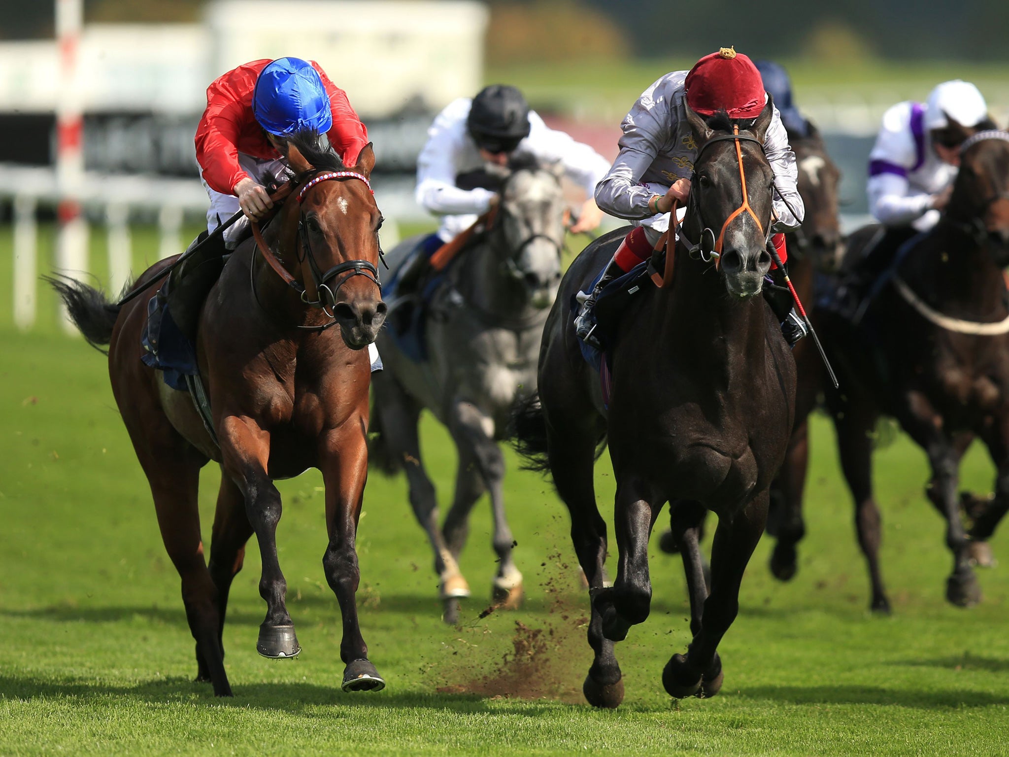 Gutaifan ridden by Frankie Dettori (centre) wins the Flying Childers Stakes at Doncaster yesterday from Ornate