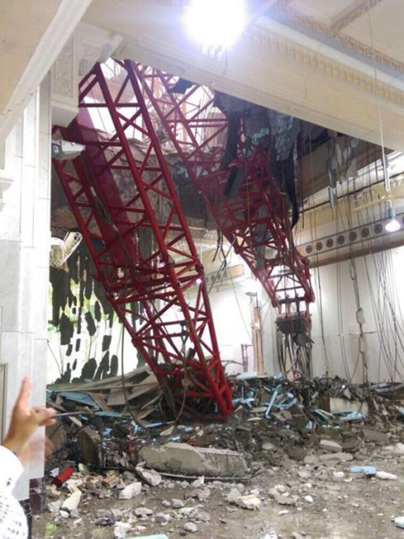 A resounding boom echoed around the city as the crane smashed through the roof