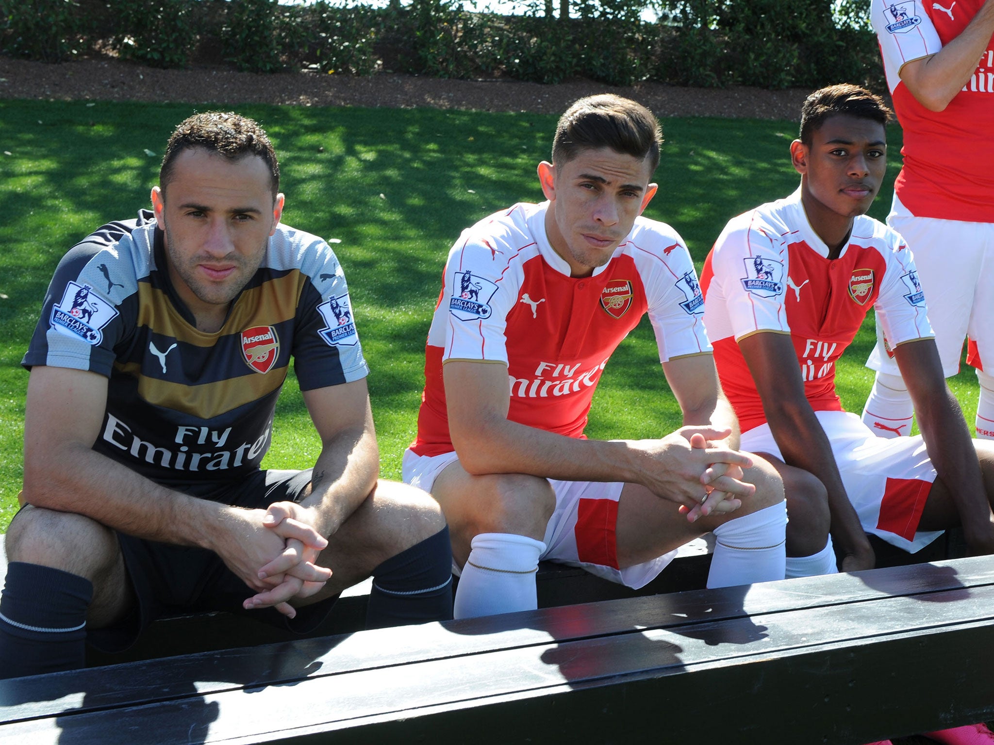 Reine-Adelaide (right) sits alongside David Ospina and Gabriel Paulista