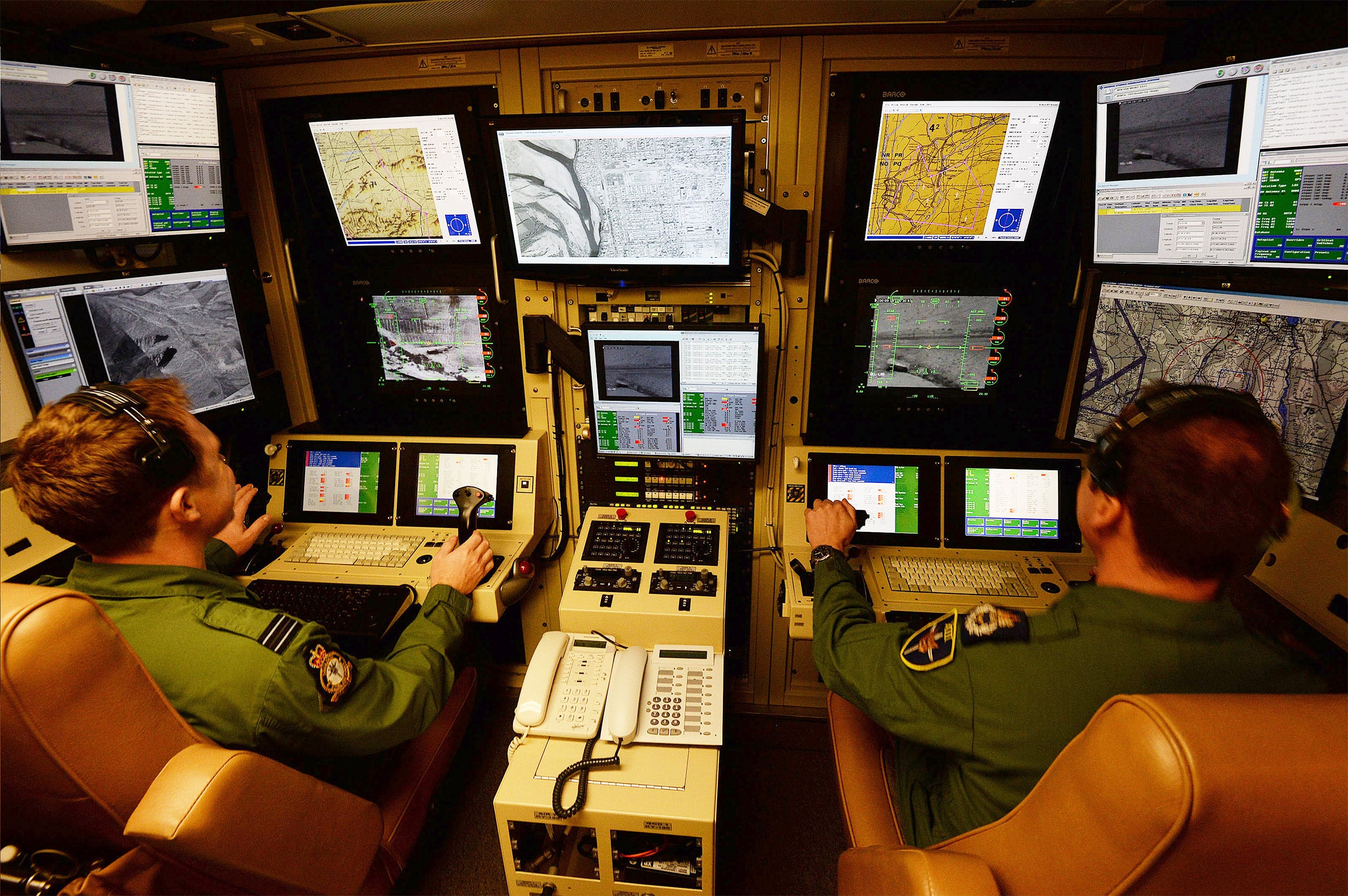 Operators at RAF Waddington control drones (Getty)