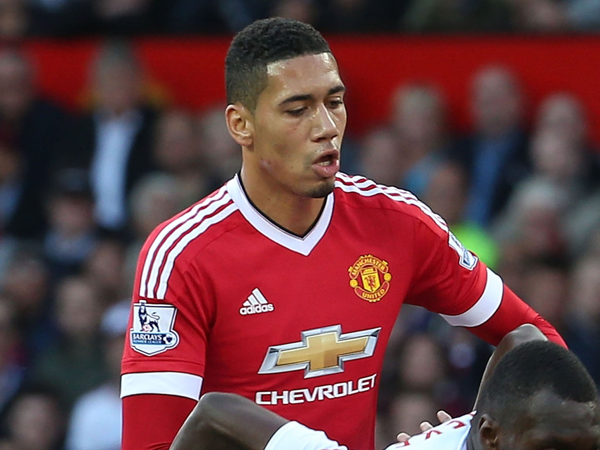 When sent off in the derby at the Etihad last season and called ‘stupid’ by Louis van Gaal, his days at Old Trafford seemed numbered.  Now, Chris ‘Mike’ Smalling is one of the club’s key players and its most reliable defender.