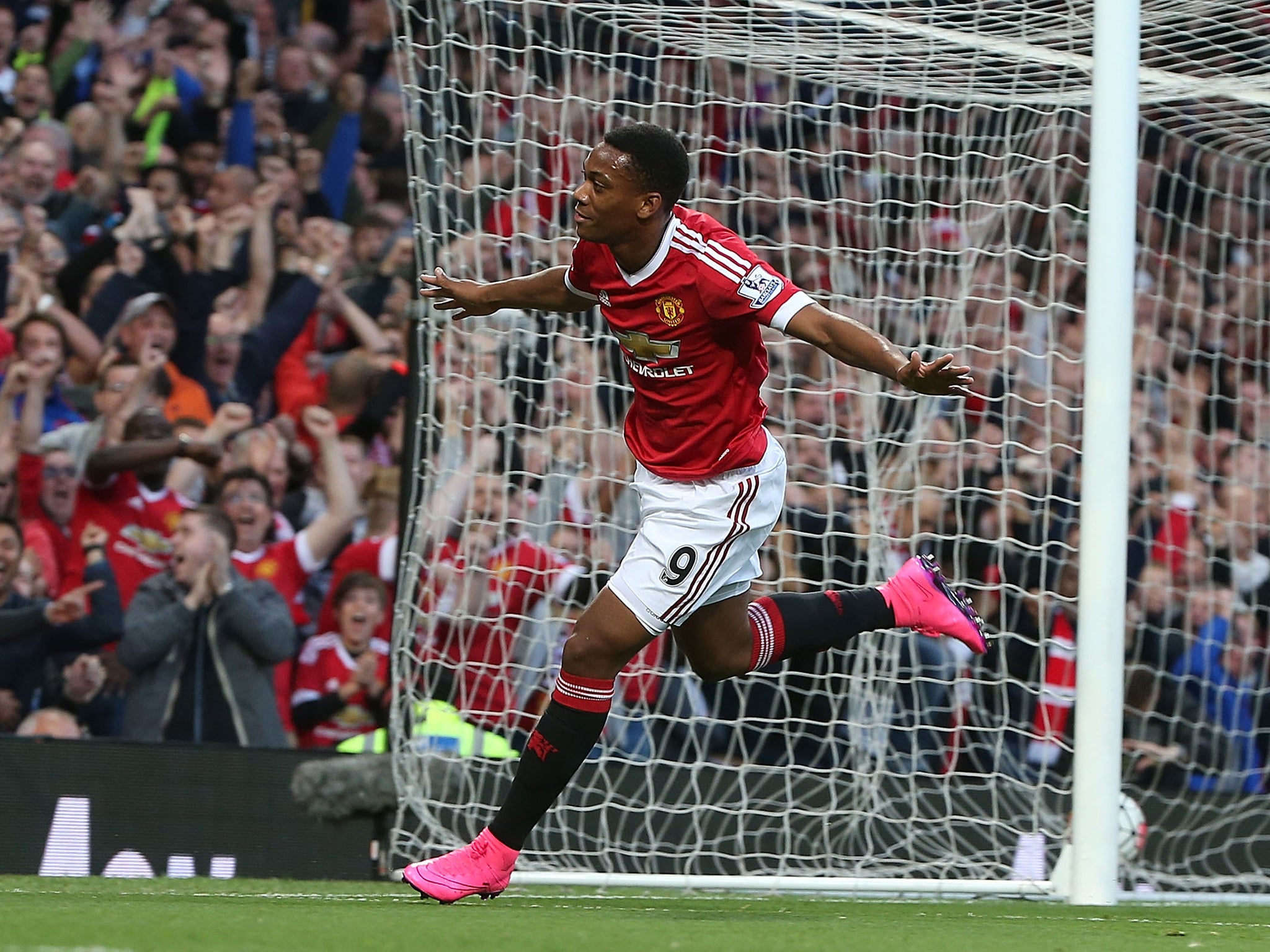 Anthony Martial celebrates scoring on his United debut