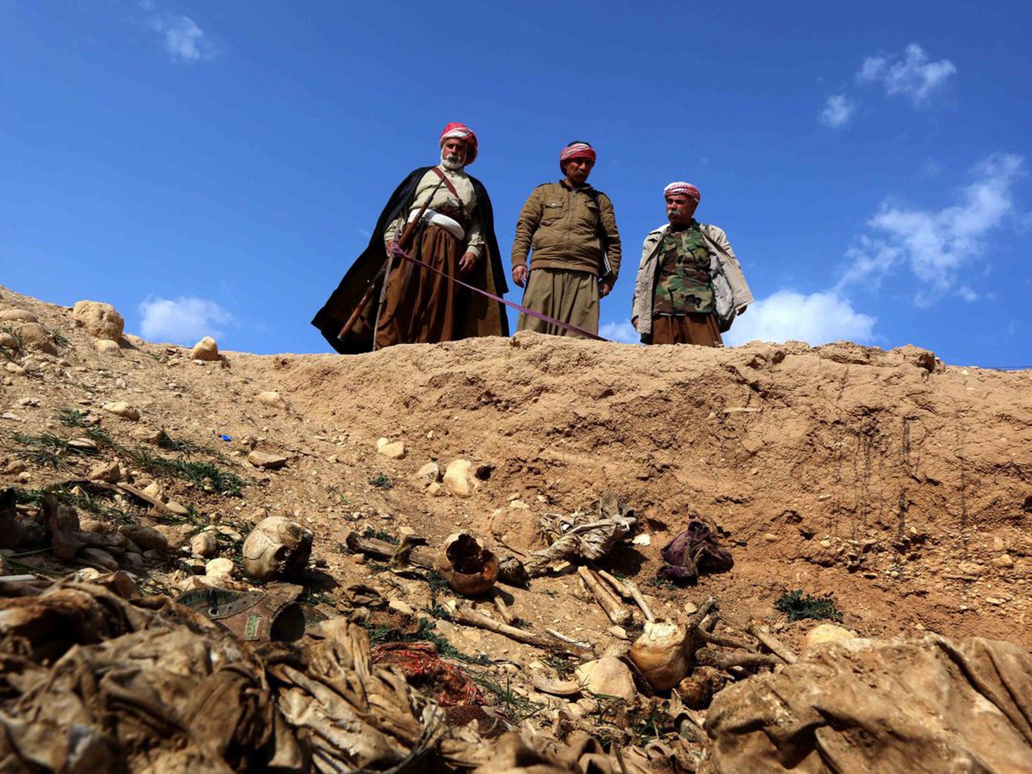 Yazidis who returned to Sinjar this year found mass graves