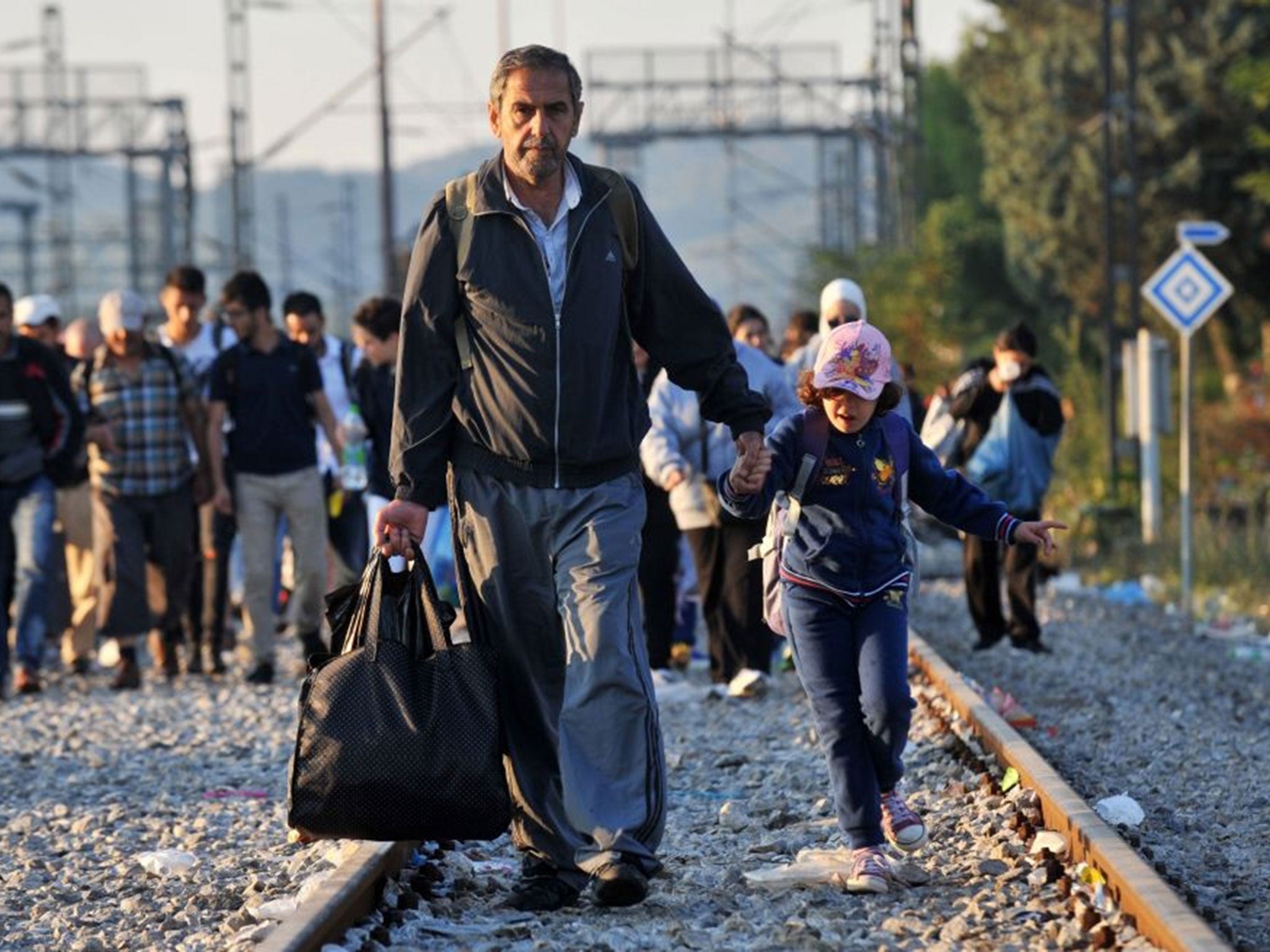 Refugees wait to cross the Greece-Macedonia border near the village of Idomeni, in northern Greece on September.